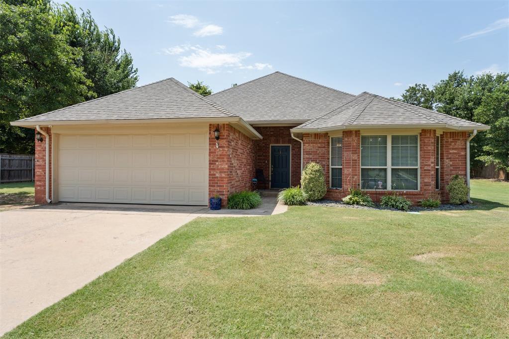 This extremely well-maintained 3 bedroom, 2 bathroom home in North Edmond offers a comfortable, open layout that makes everyday living easy. The spacious living room features a cozy fireplace and flows right into the kitchen and dining areas—great for spending time with family or entertaining friends. Out back, you’ll find a covered patio and peaceful yard that backs up to a green space and is surrounded by mature trees—offering shade, privacy, and a natural view with no neighbors directly behind you. Large windows throughout the home bring in plenty of natural light and make the space feel bright and inviting. All three bedrooms are a good size, and the primary bedroom includes its own en suite with double vanities, jetted tub, walk-in shower and a walk-in closet. The layout is simple, functional, and easy to enjoy.  Located just minutes from I-35, you'll have quick access to shopping, dining, and downtown OKC—making your daily commute or weekend plans that much easier.  Brand New Roof replaced in 2025. If you're looking for a move-in ready home in a great Edmond location with space, comfort, and a backyard full of trees and privacy then look no further and WELCOME HOME.
