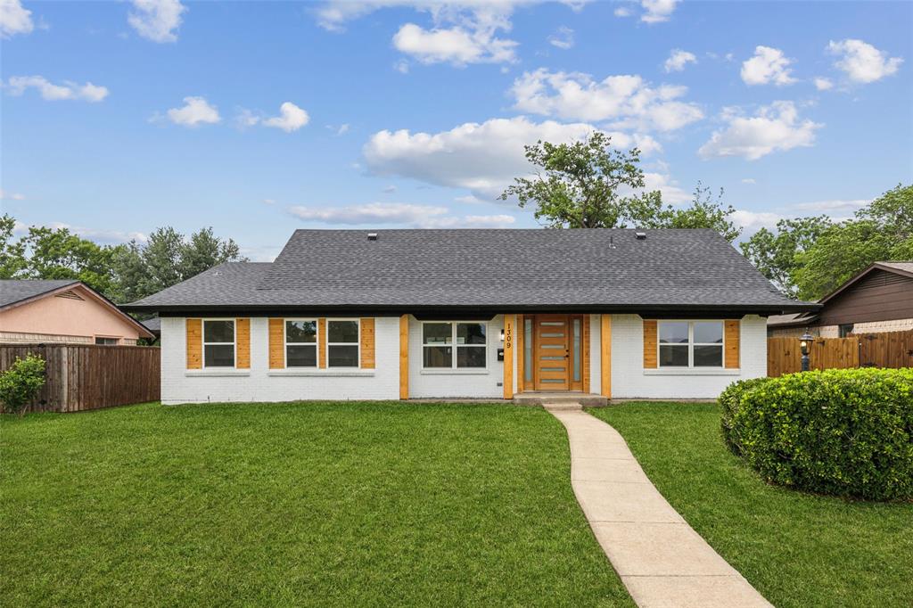 Welcome Home to Modern Comfort and Style in Richardson! Imagine pulling into a quiet street in the heart of Richardson, where a beautifully updated white brick home with warm light wood accents instantly catches your eye. It’s the perfect blend of charm and modern design—and it's completely move-in ready. Step through the front door and be greeted by a bright, airy space that feels like home from the very first moment. Just off the entry, the spacious formal living room invites you to settle in, and as you take one step down, the sunken family room reveals itself—with a bold black and white stone fireplace that commands attention. The custom tile flooring and open layout make this the perfect space for cozy nights or lively gatherings. The heart of the home, the kitchen, truly sparkles. Featuring a stunning waterfall island, an electric cooktop with sleek vent hood, and an abundance of cabinetry, it’s a space designed for both beauty and functionality. Whether you're cooking for two or entertaining a crowd, this kitchen rises to the occasion. Just off to the side, the sunny breakfast nook is the ideal spot for morning coffee or casual meals. The primary suite is a private retreat, spacious and serene. The en-suite bath feels like a luxury spa—with dual sinks, a framed mirror, a double shower, a soaking garden tub, and a generous walk-in closet. The secondary bedrooms are just as impressive—nicely sized with plenty of natural light and room to grow, work, or relax. The large backyard offers a generous patio, perfect for weekend BBQs, outdoor dining, or simply enjoying a quiet evening under the stars. And with a rear two-car garage, convenience and curb appeal go hand in hand. This turnkey home is fully renovated, thoughtfully designed, and perfectly located! All that’s missing is you.