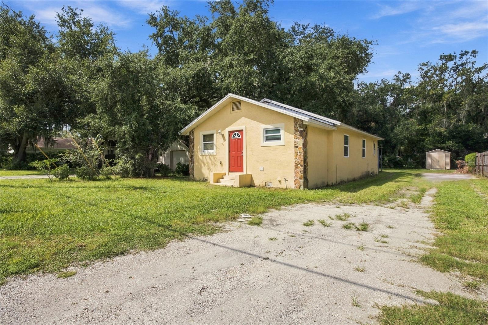 Stop your search and picture your self enjoying the fall evenings ahead, gathered around a backyard bonfire at this Plant City home! Surrounded by a wood privacy fence, the spacious yard offers ample room to entertain, relax, or create your own outdoor retreat. Comfortable living space with NO HOA! The interior was thoughtfully updated in 2020 and features a kitchen with granite countertops, updated cabinetry, and stainless-steel appliances. Washer and dryer are included! Additionally, you will appreciate the wood-look laminate flooring throughout the main living areas and ceramic tile in the bathrooms. The primary bathroom offers two separate modern his and hers vanities.Outside, you’ll also find a covered back patio, metal carport, and utility shed for additional storage. Conveniently located near Hillsborough College’s Plant City Campus, Mike E. Sansone Community Park, and I-4, providing easy access toward Tampa and Orlando.Let’s explore your options in this changing market and see how we can get you HOME for the HOLIDAYS!