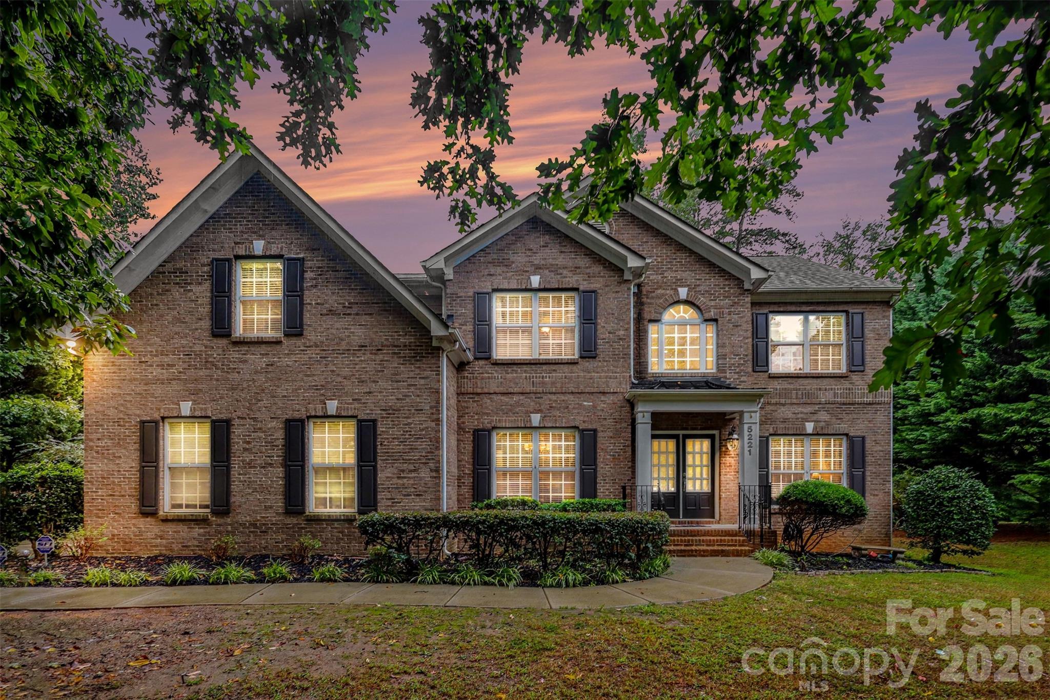Welcome to a home that beautifully blends space, comfort, and versatility! The inviting open floor plan creates a seamless flow throughout the main living areas, complemented by both a formal dining room and a separate breakfast area—perfect for hosting gatherings or enjoying everyday meals. Two additional flexible spaces on the first floor offer endless possibilities for a home office, playroom, sitting room, or hobby space. Just off the kitchen, a covered porch provides the perfect spot for morning coffee, outdoor dining, or unwinding in the shade. Upstairs, the spacious primary suite provides a private retreat, complete with a walk-in closet featuring custom built-in storage. Three additional bedrooms and a large bonus room offer plenty of room for family, guests, work, or recreation. The finished basement expands your living options even further, featuring a generous great room, multiple flex rooms, and abundant storage. Walk directly out to the spacious backyard, where there is plenty of room to relax, play, entertain, or enjoy the outdoors. Additional highlights include a three-car garage, mature foliage surrounding the home for added privacy, and access to a community pool for summertime fun and relaxation. With its flexible living spaces, abundant storage, and inviting indoor-outdoor living areas, this home offers the space and versatility to fit a variety of lifestyles. Come discover all the possibilities this wonderful home has to offer!
