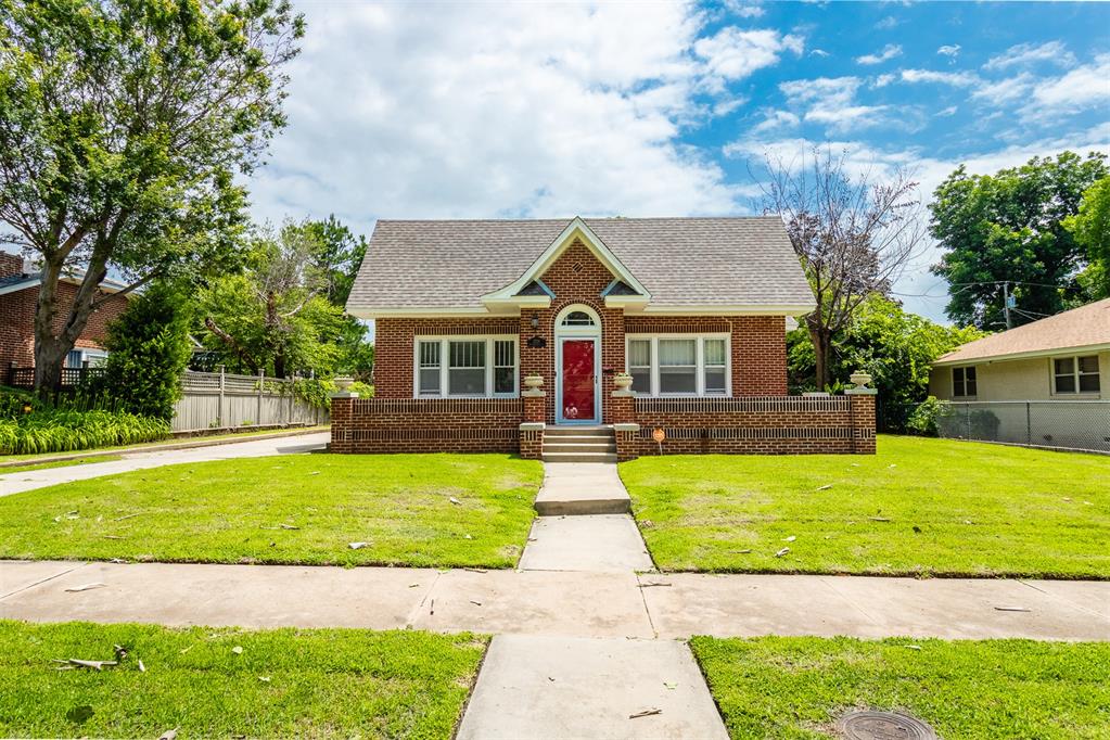 This charming historic home offers 5 bedrooms and 2 full baths, blending classic character with everyday comfort. Filled with original details, such as wood trim and hardwood floors, the home has been well-maintained over the years. A spacious layout provides flexibility for families or those needing extra room to work or relax. Outside, enjoy a large lot and a detached 2-car garage for added convenience. It's a beautiful, move-in-ready home with plenty of charm and space to enjoy.