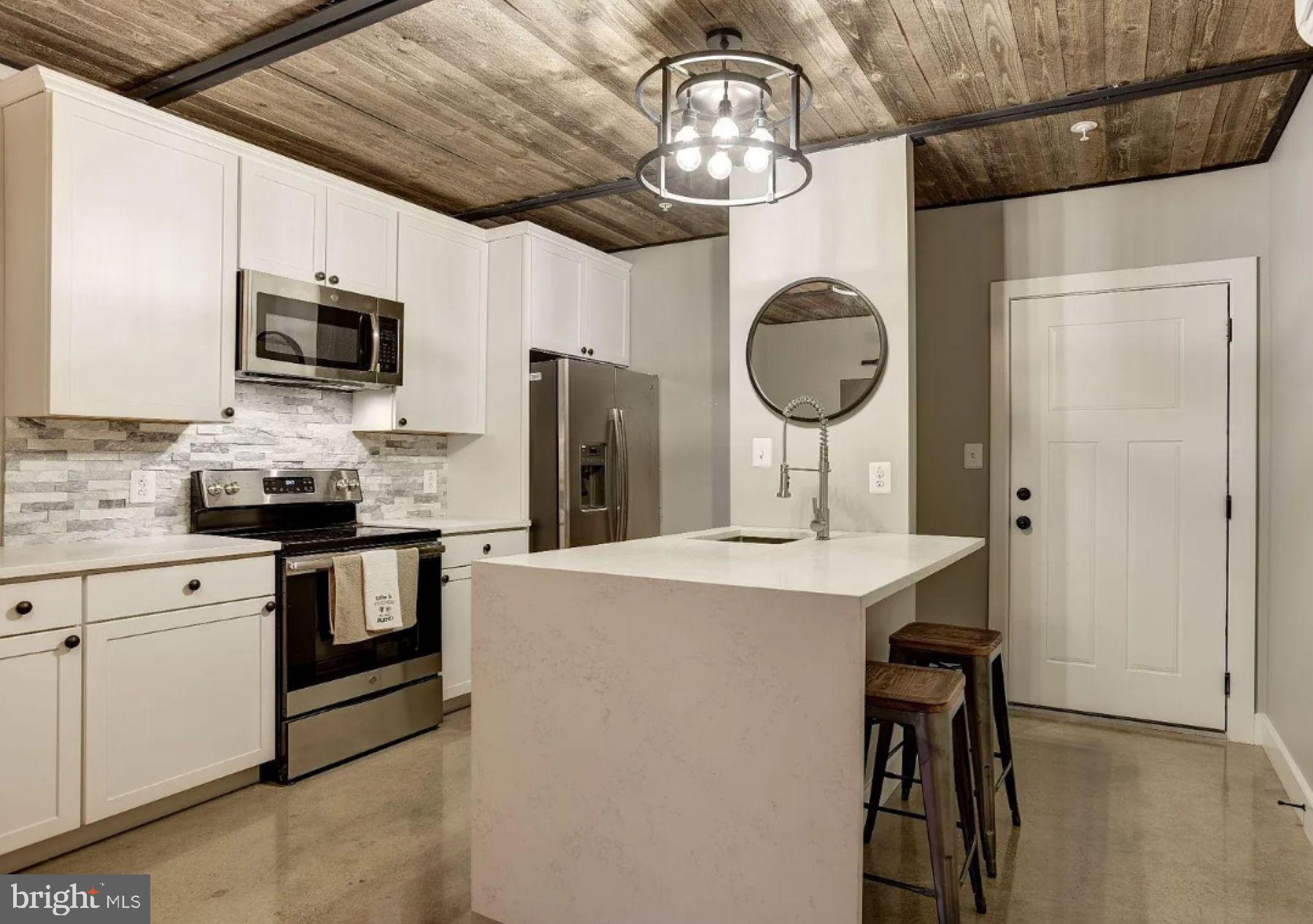 Welcome to Vision, fully renovated in 2021, is a boutique apartment building in historic Federal Hill under new management and ownership. This one-bedroom home is professionally designed and has beautiful aesthetics including reclaimed wood and shiplap ceilings. The living room is spacious with tall ceilings; open floor plan and a cozy gas fireplace as featured in our model home photos. The kitchen is luxurious featuring a marble waterfall island and high-end appliances.  Additional resident amenities include a second-floor party room and outdoor patio — ideal for entertaining, relaxing, or connecting with neighbors.Welcome to Federal Hill, your gateway to the Charm City Experience. Nestled within the city's historic heart, Federal Hill is a thriving neighborhood known for its unique blend of old-world character and modern vitality. With Federal Hill Park as its centerpiece, offering breathtaking vistas of the Inner Harbor, you'll find yourself at the epicenter of Baltimore's dynamic urban life. Your oasis at Vision awaits, and we look forward to helping you find your dream home!