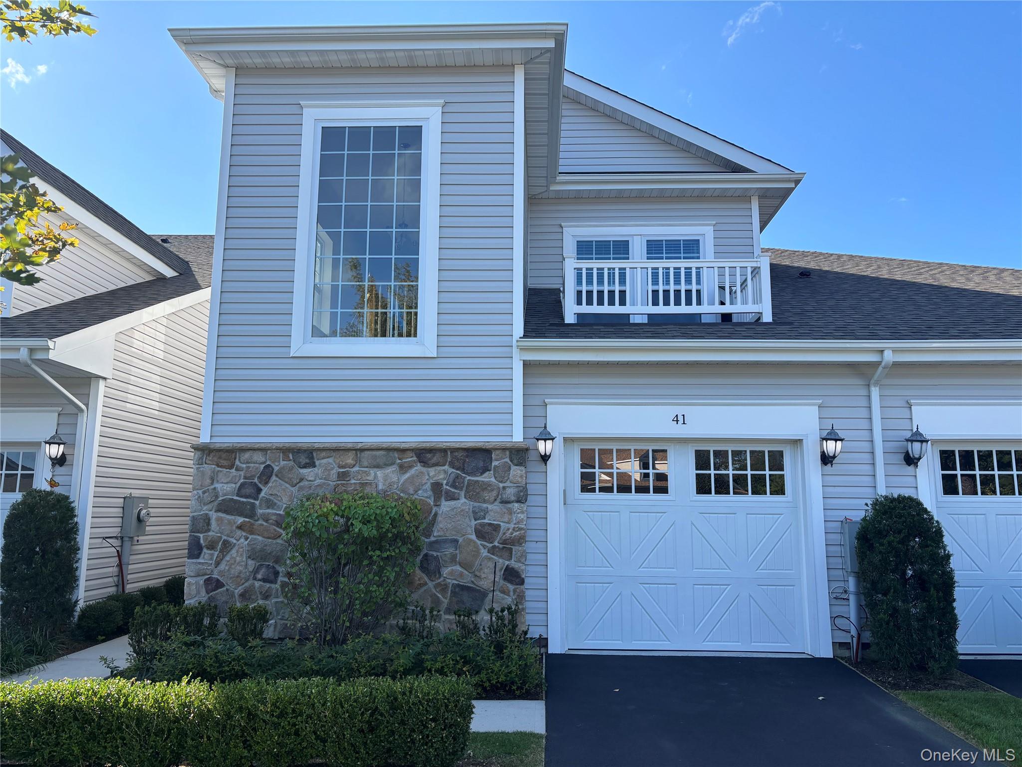 Welcome to The Manors at Colony Preserve! This is a gated 55+ community which offers a lifestyle of amenities and much more. Easy living in this upper-level complete with private elevator. Open floor plan with spacious open dining room and living room, EIK with balcony to enjoy your morning coffee with a view! Large bonus room, great for office media room or just storage. 2-bedroom, 2 full bath unit features modern construction with high ceilings and many additional upgrades including high hats, fans, bath tiles, crown moldings and much more. Two big walk-in closets, Laundry and central air. Garage, driveway and plenty of guest parking. Close to clubhouse! Amazingly minutes away from the Fire Island National Seashore, and parks with walking trails. Come experience this lifestyle at the Manors! Sale may be subject to terms and conditions of an offering plan. Buyer and buyer's agent to verify all information. Condo fee is $122, HOA is $559., for a total of $681. Water, sewer, trash, snow removal, and ground care, clubhouse and fitness center all included.