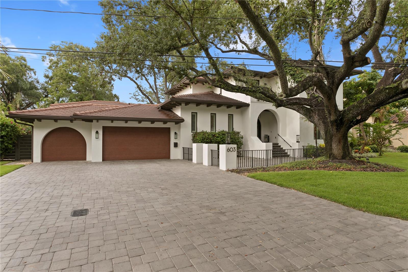 Welcome to beautiful Davis Islands! Enjoy the upscale, waterfront lifestyle and charm that make this community one of Tampa’s most sought-after neighborhoods. This stunning 4-bedroom, 3.5-bathroom with a pool bathroom Mediterranean-style canal home was thoughtfully redesigned by Oxford Design in 2019 and offers a wonderful blend of timeless style, spacious living, and exceptional outdoor spaces. The home features high-end appliances and a generous outdoor living area that is perfect for entertaining family and friends or simply enjoying the Florida lifestyle. A newly installed putting green adds an extra touch of fun and luxury to the outdoor space. Located in an A+ school district with access to top-rated schools, this home is also conveniently located near Downtown Tampa, Water Street, Tampa General Hospital, and an array of exceptional dining, shopping, and entertainment options. A wonderful opportunity to experience the best of Davis Islands living—this home is a must-see!