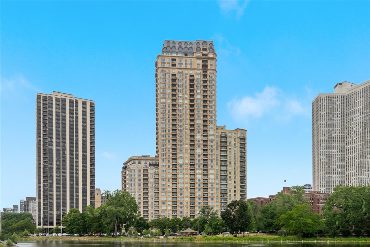 Welcome to this remarkable residence perched high atop the prestigious and rarely available 2550 Lakeview-Lincoln Park's most coveted address. Here, bespoke updates blend seamlessly with timeless elegance to create a home like no other. A beautiful panorama of the City skyline, Lake, lagoon, and Lincoln Park, with front-row views from your private east-facing balcony await. No detail has been overlooked. Custom millwork, curated lighting, and luxurious finishes elevate every space. Enjoy entertaining from your elegantly renovated kitchen complete with high-end cabinetry, full height slab backsplash and countertop with waterfall edge, and chef grade appliances. The open floor plan invites the Lake indoors, anchored by a striking bay window framing the view. Retreat to your primary suite, where a spa-inspired bath awaits with a deep soaking tub, beautifully crafted custom tilework, and dual walk-in closets and direct access to the balcony. Two additional bedrooms with en-suite baths offer the perfect blend of comfort and sophistication-ideal for family, guests, or a private office. Expansive western views provide a beautiful backdrop, filling the rooms with warm afternoon light.  Nearby, a well-appointed powder room and a discreet laundry closet add everyday convenience. Unmatched luxury services and amenities include an indoor pool, sauna, whirlpool, state-of-the-art fitness center, club room, billiards room, theater, game room, dog run, paw wash plus a 1.25-acre private park! Valet guest parking, 24 hr. doorman! 1 deeded tandem parking space available. Outstanding property in Lincoln Park's finest building!