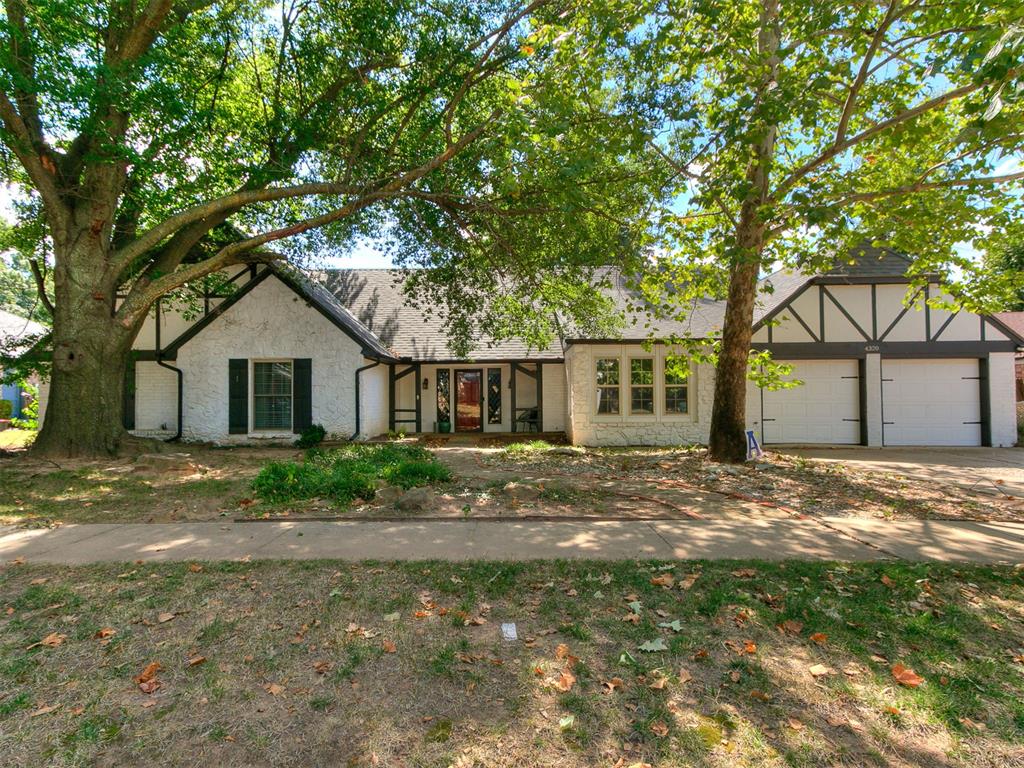 Welcome to Brookhaven in West Norman, where this 2,776 sq. ft. home blends timeless charm with thoughtful updates & plenty of space for making memories. Tucked beneath a canopy of mature trees, the moment you pull up you will fall in love with the traditional charm. Step inside and you’re greeted by rich wood floors that carry you through the entry, into the formal dining, and on into the heart of the home. The living room feels warm and inviting with its cathedral ceilings, accented by stained beams that add both character and a cozy sense of grandeur. The kitchen has been beautifully updated with modern white cabinetry, sleek black hardware, stainless steel appliances, and a gorgeous butcher block countertop—making it the perfect place to cook, gather, and laugh together. Brick-look tile in the kitchen and high-traffic areas means both style and durability, while the openness of the floor plan makes every space feel connected. The primary suite is a true retreat, complete with floor-to-ceiling built-in cabinetry that provides ample storage and eliminates the need for bulky furniture. A sliding barn door leads you to the spa-like bathroom, where style and function come together. Outside, the backyard is ready for both relaxation and fun. A spacious wood deck offers the perfect spot for grilling or unwinding with friends, while the sparkling inground pool—with a slide and cover—sets the stage for endless summer memories. A storage shed provides extra space for tools or hobbies, and the above-ground storm shelter in the garage gives peace of mind when Oklahoma weather turns unpredictable. With four bedrooms, two and a half bathrooms, and spaces designed for both comfort and entertaining, this Brookhaven beauty is more than just a house—it’s a home waiting for its next chapter. Whether it’s quiet evenings under the trees, poolside weekends with family, or simply enjoying the warmth of your own living room, this property has a way of making you feel right at home.