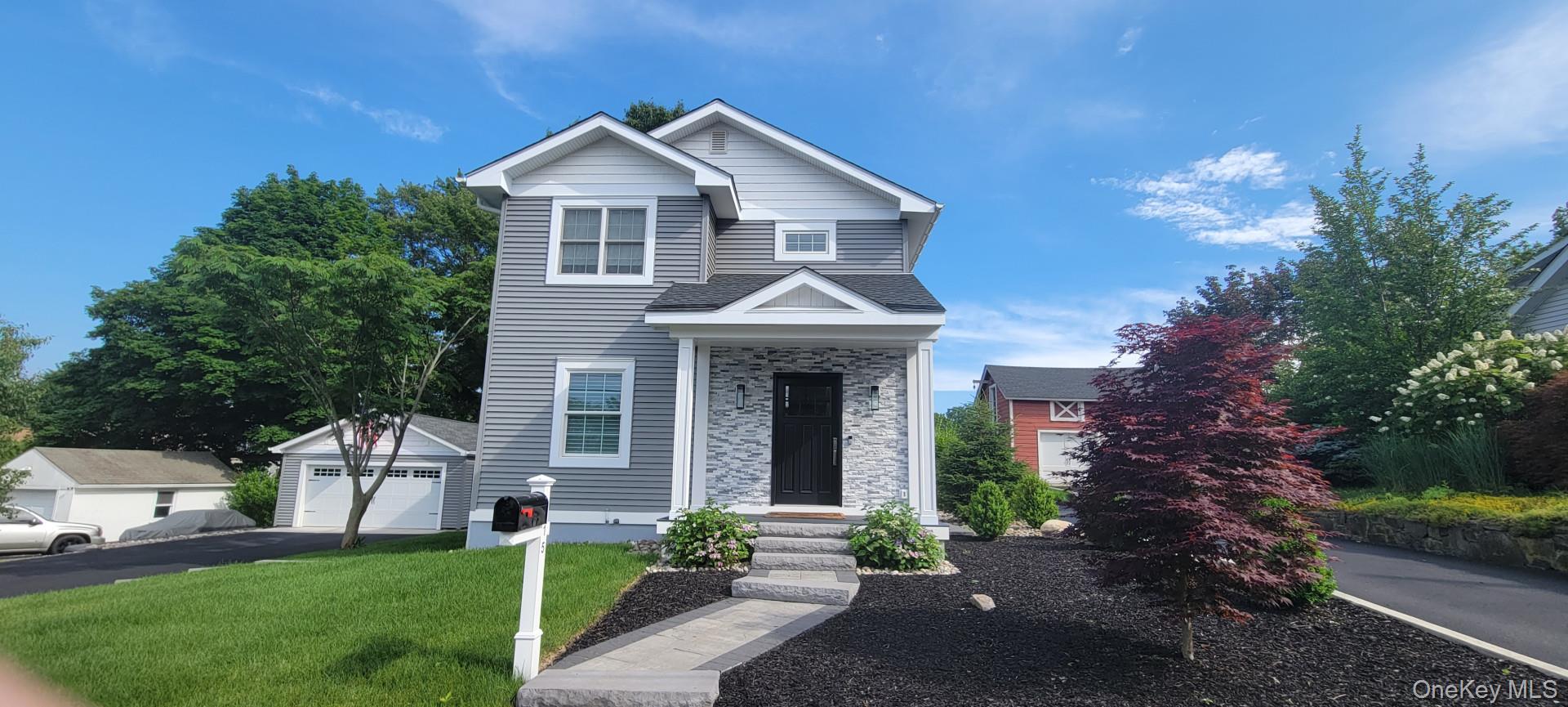 Welcome to this charming single-family home located at 215 Catherine St in Buchanan, NY. Built in 1922, the house was taken down and rebuilt, being completed in 2021 from the foundation up, including all new electrical service, plumbing, heating, and ventilation, as well as a whole-house water filtration system and lawn irrigation, plus a state-of-the-art HVAC and two hot water systems for redundancy. There are all-new Marvin windows and custom solid-core doors with Emtek hardware.

Step inside to a formal dining area, adjacent to the living room, and a semi-open floor plan. Off the dining area is a gourmet kitchen with a 42" Sub-Zero refrigerator and a 48" double oven/6-burner and griddle Wolf range.  There is a full bathroom on the first floor with a walk-in shower.

Follow the wide stairwell up to three bedrooms, a full bathroom featuring a bubble massage tub and body sprays, and a separate laundry room.

The primary bedroom has two walk-in closets. There are two additional bedrooms with ample daylight and closets throughout.

Plenty of natural daylight, hardwood floors throughout, and all tile floors have radiant heat. 

There is a detached two-car garage with a separate electrical service ideal for multiple purposes. Multi-level yards are well-maintained and landscaped, as well as several patio areas, and underground future plumbing and electrical for a future exterior kitchen. Ideal for entertaining and ample room for a future pool. 

Your new home features smart technology, is ready and equipped for all future needs, and is conveniently located near major roadways and Metro-North for commuting.