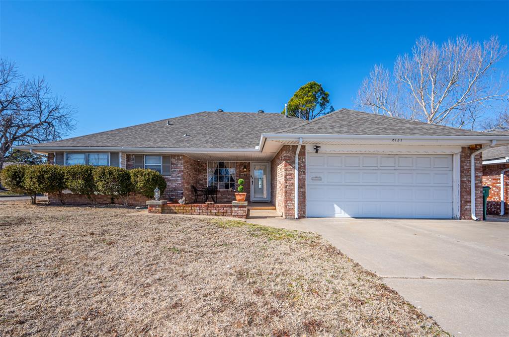 Prime location and well-cared for! 3 bed, 2 bath, with media/flex room. Light, bright, open floor plan with vaulted ceiling. Neutral paint throughout.  Ample storage in kitchen with custom cabinets, granite and stainless steel appliances.  Refrigerator remains.  Kitchen also has a pantry and built-in desk.  Kitchen is tile, and living/dining area is laminate wood flooring. Media room includes built-in surround sound. Newer roof, hot water tank, and HVAC system. Tornado shelter in garage floor. Small storage shelter in back yard, also a covered space to park a car or boat. Nice sized backyard.   Easy access to I-240.