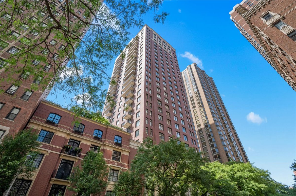 With 3 bedrooms and 2.1 bathrooms, this nearly 2,000 sq. ft. home offers maintenance-free living in a well kept, newer building. The open concept floor plan is perfect for both everyday comfort and entertaining, featuring a spacious living area with sweeping city and lake views from the balcony, plus room for a full dining table. The updated kitchen includes granite countertops, additional custom storage, and a seamless flow into the living and dining areas. Just off the main space, a 20' x 5' balcony provides south-facing views, including the lake. The large primary suite showcases west-facing windows, two closets (including a walk-in), and a recently renovated spa-like bath with a double vanity, glass enclosed walk in shower, and bench seating. Two additional bedrooms are tucked on the opposite side of the condo, ideal for guests, a nursery, or a home office, served by a full bath and a convenient powder room for visitors. Additional highlights include a full size side by side washer and dryer in a spacious laundry closet, heated garage parking (included in the price), and building amenities such as a fitness center, party room, 24 hour doorman, and rooftop deck with stunning lake views. All of this in a prime Gold Coast location, steps to the lakefront, renowned dining, shopping, and easy public transit. Don't miss this opportunity to own a sophisticated home in one of Chicago's most historic and vibrant neighborhoods.