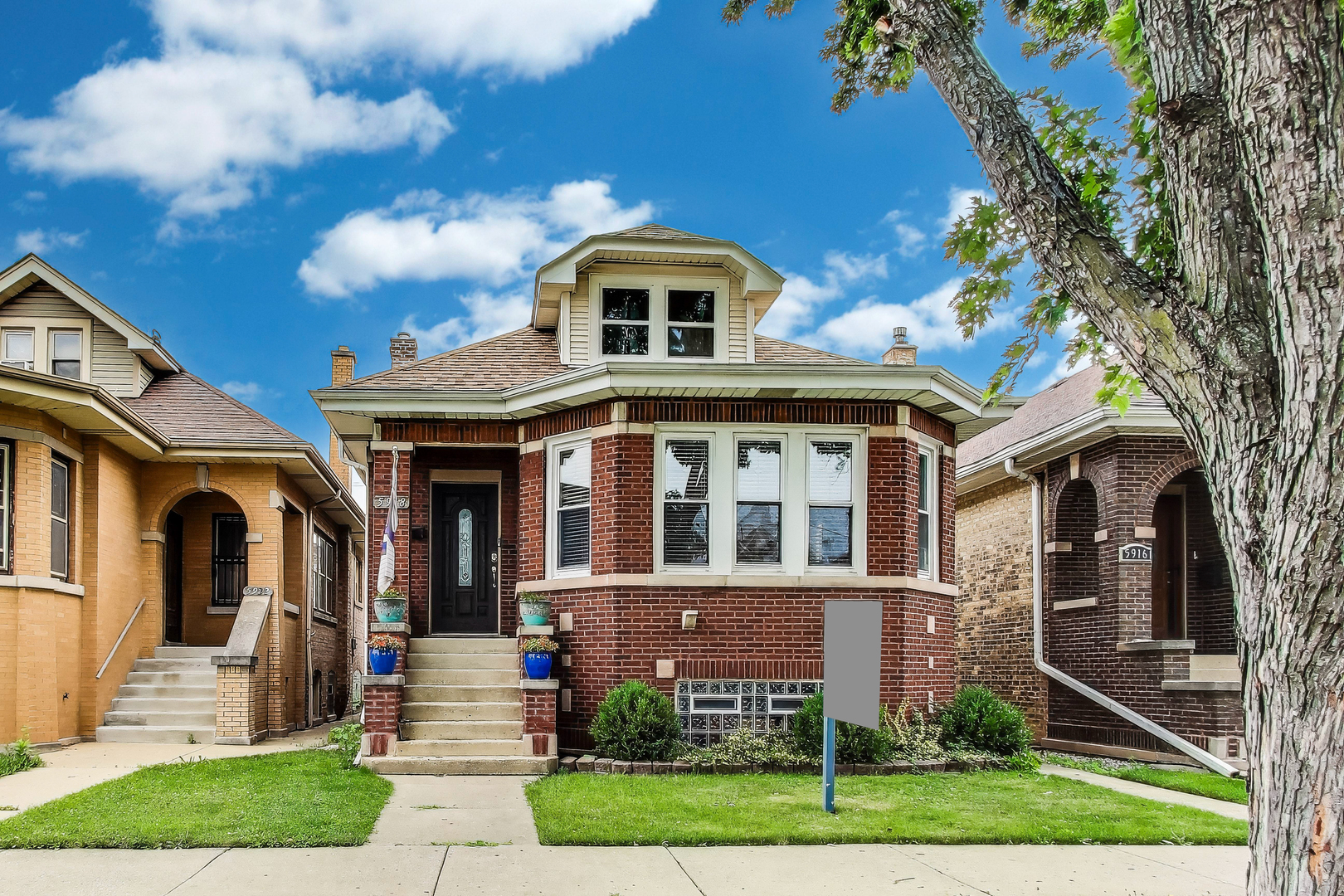 Stunning updated bungalow in hot Portage Park! Home rehabbed in 2018 features over 3000 sa ft of living space that includes hardwood floors, coffered ceilings, and a bright kitchen with granite counters, stainless appliances, and herringbone backsplash. Main level has 2 bedrooms and a full bath; 2 more bedrooms and another bath upstairs. Finished basement offers a large rec room, 2 more bedrooms, full bath, and laundry room with yard access. Enjoy a spacious deck, fenced yard, and 2.5-car garage. Ideal for work-from-home, e-learning, or entertaining! 15 min to blue line and Ohare, 5min to metra, convenient to expressways and public transit.