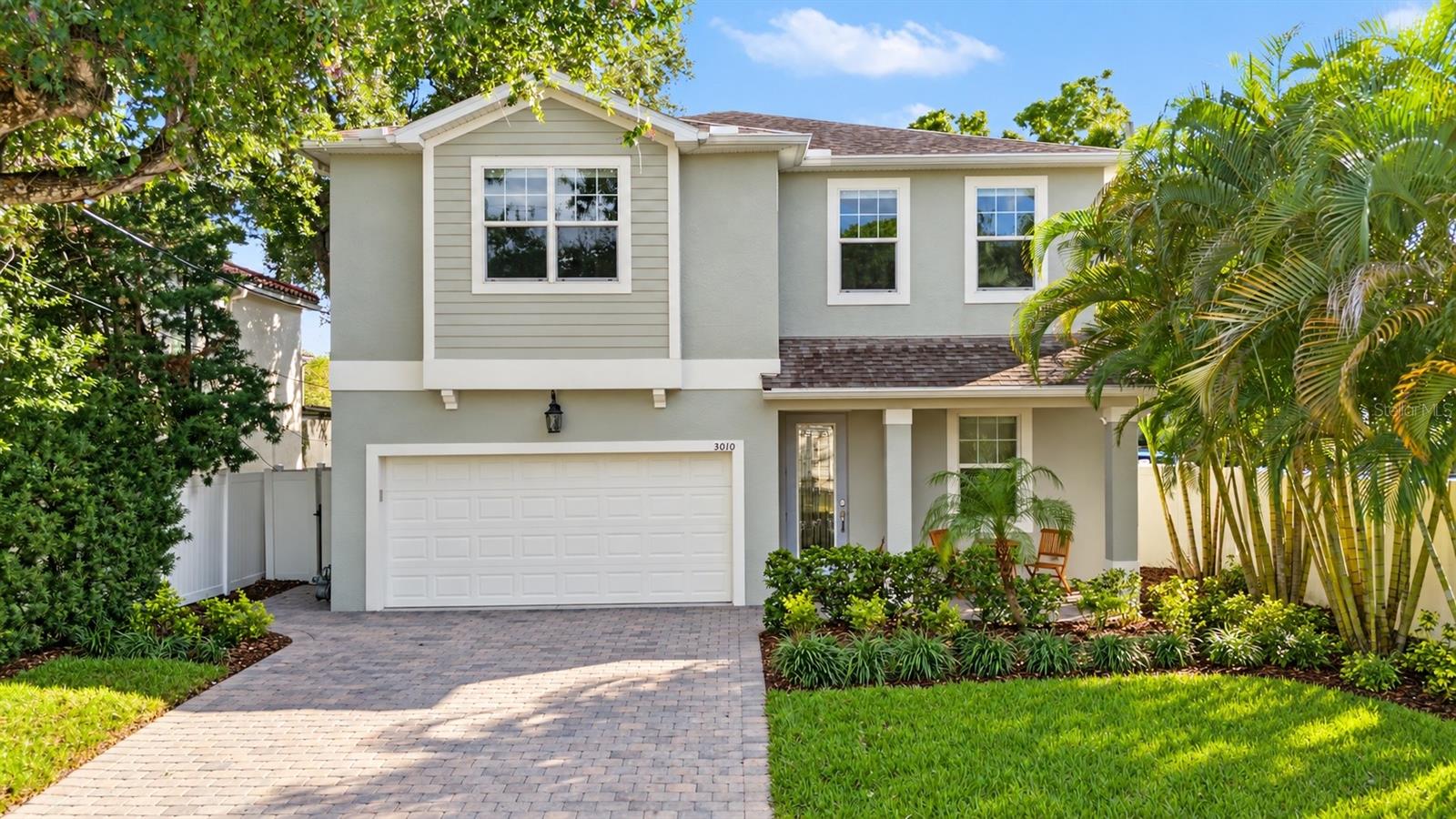Welcome to this beautifully refreshed 5-bedroom, 4-bathroom home in the heart of highly desirable Palma Ceia. Recently updated with fresh interior and exterior paint, refinished details throughout, all new landscaping/sod, updated light fixtures and beautifully revived flooring, this home feels polished, move-in ready and thoughtfully prepared for its next owner.Offering four spacious bedrooms, a dedicated office that can easily function as a fifth bedroom with full bath in the shared hall, three full bathrooms and a two-car garage. The floor plan delivers the space, flexibility and functionality today’s buyers are looking for.A charming rocking-chair front porch and paver driveway set the tone with welcoming curb appeal. Inside, a versatile front living space offers endless possibilities as a formal sitting room, dining room or additional flex space. The heart of the home is the expansive open-concept kitchen and living area, where oversized windows fill the space with natural light. The kitchen is designed for both everyday living and entertaining, featuring granite countertops, a generous breakfast bar, stainless steel appliances, a gas range and double ovens. Engineered hardwood flooring and custom window treatments add warmth and continuity throughout the first floor.Just off the main living area, a dedicated office and full bathroom provide an ideal setup for working from home, hosting overnight guests or creating a private fifth-bedroom suite.Upstairs, four large bedrooms surround a spacious central landing, along with laundry room complete with a utility sink. The primary suite is a true retreat, featuring a walk-in closet and en-suite bath with a soaking tub, separate shower, dual vanities and private water closet. One secondary bedroom includes its own en-suite bathroom, while the remaining two bedrooms share a convenient Jack-and-Jill bath. Every bedroom features a walk-in closet, offering exceptional storage throughout.Ideally situated near Palma Ceia Country Club, Bayshore Boulevard, Hyde Park Village, Cru Cellars, Counter Culture and some of South Tampa’s best dining, shopping and everyday conveniences. Palma Ceia Park and the neighborhood dog park are also just a short five-minute walk away.With its fresh updates, modern construction, exceptionally functional floor plan and sought-after Palma Ceia location, this is a home that checks all the boxes.