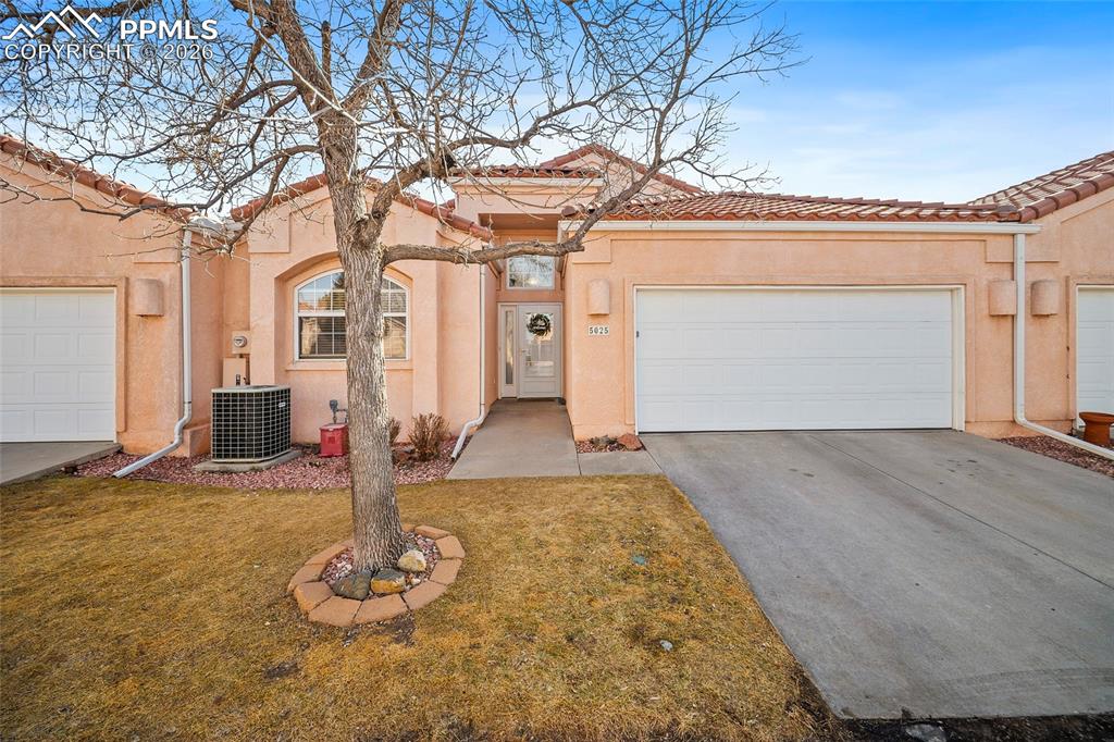 Mountain and city views! Welcome to effortless, low-maintenance living on the desirable west side of Colorado Springs. This ranch-style home with a walk-out basement offers the perfect blend of comfort, space, and convenience — all wrapped in stunning scenery.Step inside to an open floorplan filled with tons of natural light, vaulted ceilings, fresh new paint, and new flooring throughout. The spacious living areas flow seamlessly, highlighted by a cozy fireplace and a touch of Spanish flair that adds warmth and character. The kitchen is designed for both everyday living and entertaining, featuring a large island, pantry, abundant countertop space, and generous storage.The main level primary suite is a true retreat, complete with a private balcony showcasing breathtaking views, a large five-piece bathroom, and expansive closet space. Large bedrooms throughout the home ensure comfort for family and guests alike, while the finished walk-out basement offers 9-foot ceilings, additional living space, and incredible storage options.Enjoy Colorado’s beautiful weather from not one, but three decks, each offering its own unique vantage point. The oversized two-car garage adds even more practicality.Located near the former Sunbird Restaurant site and just minutes from Garden of the Gods, downtown Colorado Springs, and easy access to I-25, this home places you close to everything while still offering peaceful west-side living.If you’ve been searching for views, space, and simplicity — this is it.  This is one of Colorado's Finest.