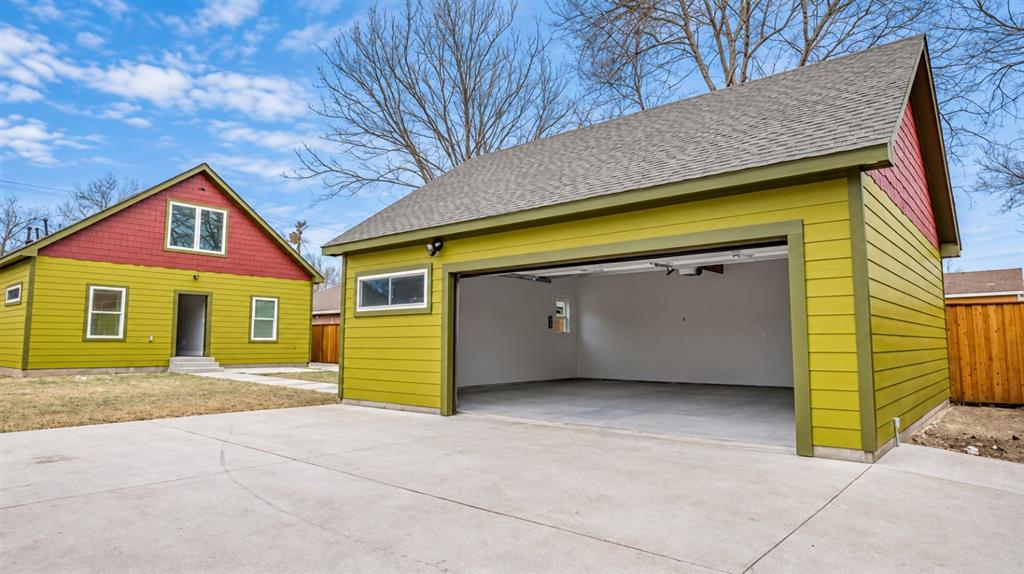 This contemporary two-story home offers 4 bedrooms, 3 full bathrooms, and approximately 2,174 square feet of living space. The flexible layout features three bedrooms on the main level, including the primary bedroom, plus an additional bedroom and living area upstairs. Enjoy an open kitchen, dining, and living space with granite countertops and stainless steel appliances. A private fenced backyard, covered patio, detached two-car garage, rear alley access, and electric gate add convenience. No HOA. Conveniently located near Downtown Dallas, shopping, dining, and major roadways.