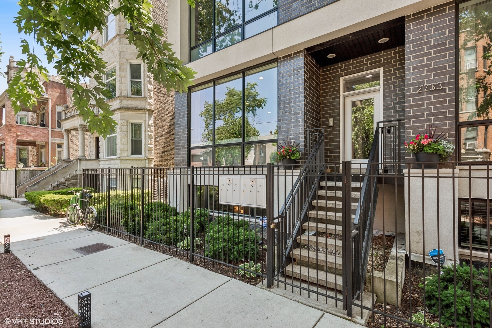 Practically overlooking gorgeous Humboldt Park, this eight-year-young East Humboldt property seamlessly blends modern elegance with everyday comfort. Boasting impressively high ceilings on both floors, the spacious interiors are flooded with impeccable natural light from the floor-to-ceiling windows, creating an inviting and airy atmosphere. Modern finishes throughout the home add a touch of sophistication, while the ample storage ensures everything has its place. The new smudge-proof fridge perfectly blends style and function, complementing the freshly renovated lower-level bathroom and the custom carpentry and closet work. With two private outdoor spaces, this home's larger deck is ready for entertaining and features a louvered pergola that's just days old. This building is in excellent health, and the vibrant community vibe of East Humboldt Park enhances the home's charm, making it the perfect sanctuary in the city. Whether you're drawn to the modern turnkey appeal or the walkability to grocery stores, transit, and the 197+ acres of park, this home offers a lifestyle that perfectly balances luxury features with homeyness.