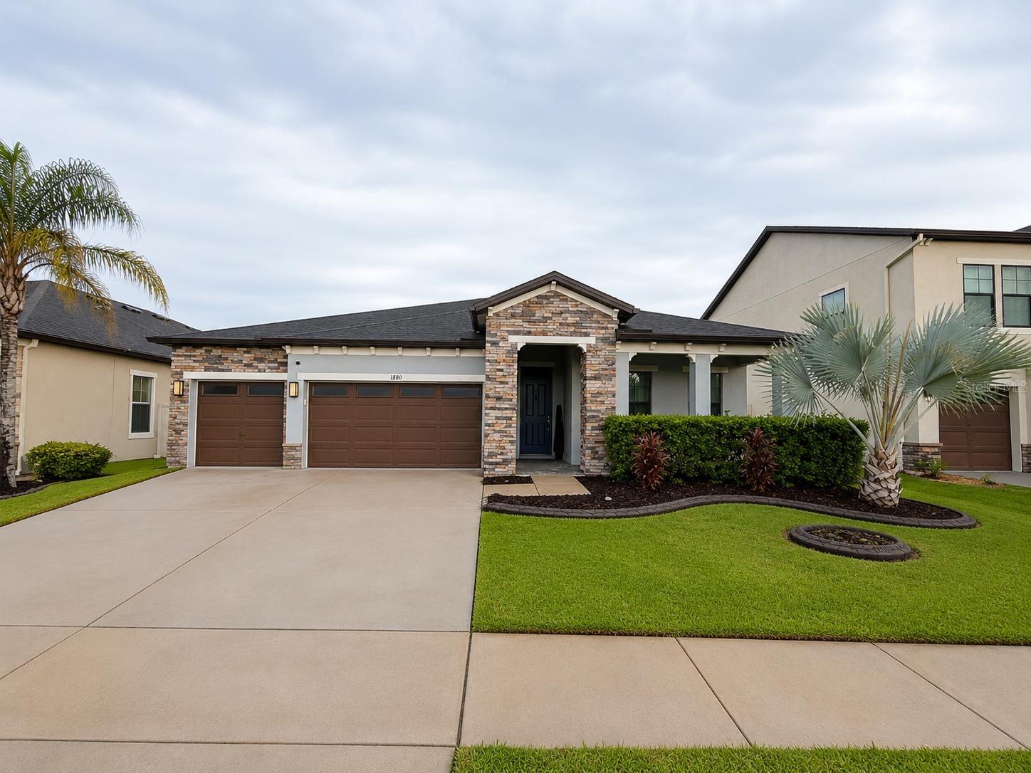 Welcome to this beautifully upgraded 4-bedroom, 3-bath residence in Union Park, one of Wesley Chapel’s desirable master-planned communities. From the moment you arrive, this home showcases thoughtful improvements, modern finishes, and exceptional functionality designed for comfortable Florida living. The beautifully remodeled kitchen features elegant quartz countertops and offers an updated, stylish setting for everyday living and entertaining, while the remodeled bathrooms also include quartz countertops and provide fresh, contemporary finishes throughout. Major improvements include a 2025 roof and 2025 Water heater, adding valuable peace of mind for the next owner. Additional features include a wholehome central vacuum system, a water filtration system, and a reverse osmosis system for drinking water. Modern blinds of the living room and the kitchen home complement the clean, contemporary feel. The spacious layout offers four bedrooms and three full bathrooms, providing flexibility for guests, work-from-home space, and everyday living. The primary suite offers a private retreat with a comfortable bedroom and beautifully updated bath. The open living areas provide an inviting flow between the main living spaces, while abundant natural light enhances the home’s warm and welcoming atmosphere. Step outside to the fenced backyard and covered outdoor sitting area, creating an ideal setting for morning coffee, weekend gatherings, outdoor dining, or simply enjoying the Florida lifestyle.  Located within Union Park Phase 3A, residents can enjoy an impressive collection of community amenities, including resort-style pools, clubhouse facilities, fitness areas, playgrounds, walking and recreational trails, and outdoor spaces designed for recreation and relaxation. The Wesley Chapel location provides convenient access to shopping, dining, entertainment, recreation, major roadways, and everyday conveniences. With its extensive list of updates, modern features, and access to Union Park amenities, this home presents an outstanding opportunity to enjoy the best of contemporary Wesley Chapel living.