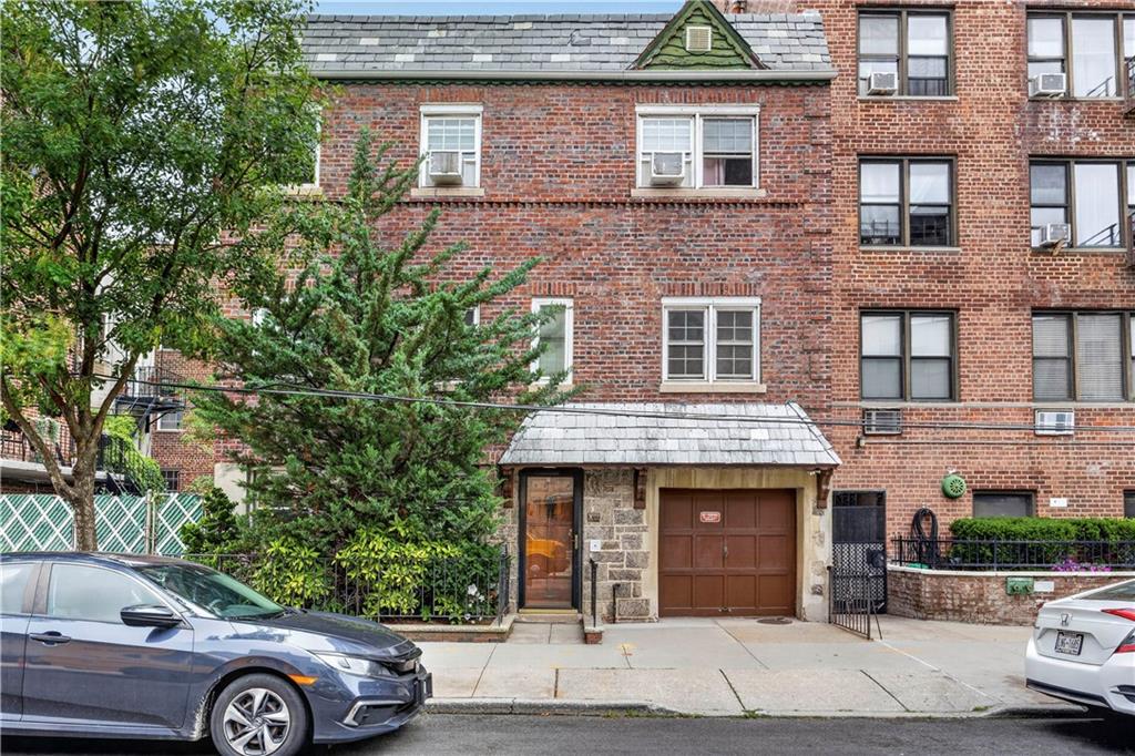 We are proud to present a fully detached solid-brick legal three-family home. Building Sq. Ft. 3,255 featuring a private driveway and one-car garage, ideally situated in one of Bay Ridge’s most sought-after residential pockets. This exceptional income-producing property offers a 2-bedroom over 2-bedroom over 1-bedroom layout, with the 2nd and 3rd floors each providing a valuable additional 3rd bedroom for expanded living flexibility each unit has a washer and dryer.The home enjoys beautiful southern exposure that fills the interior with natural light, along with harbor views from the upper floors — a rare and desirable feature in this location. Additional highlights include generous closet and storage space, recessed lighting, and skylights that enhance the home’s bright, welcoming atmosphere. An ultra-private backyard provides the perfect setting for outdoor enjoyment.Located just moments from the Shore Road promenade, dog park, and waterfront greenspace, and minutes from express bus service, the R train, the NYC Ferry, top schools, restaurants, supermarkets, and parks. A rare opportunity to own a substantial multi-family property in a premier Brooklyn neighborhood. Some photos are staged.