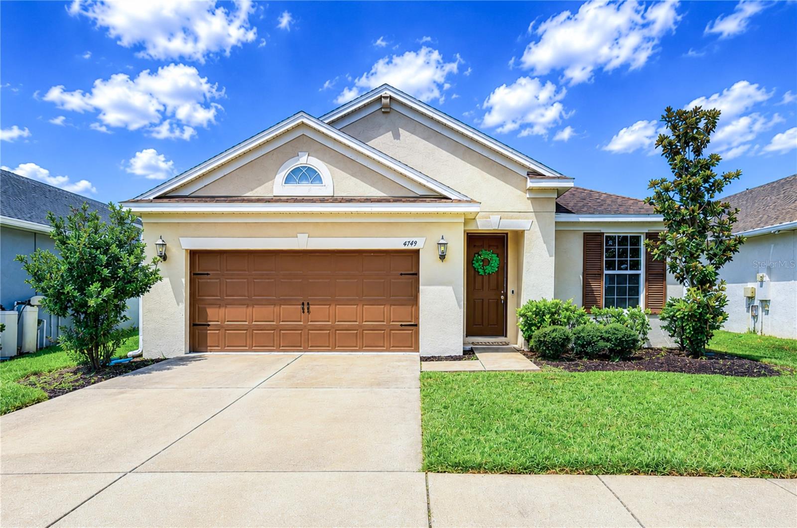 Nestled in the highly sought-after Country Walk community of Wesley Chapel, this beautifully updated 4-bedroom, 2-bathroom home with a dedicated office offers the perfect blend of modern comfort, functional living space, and move-in-ready convenience. The open-concept floor plan features a spacious great room and dining area that flow seamlessly into the large eat-in kitchen, complete with stone countertops, abundant cabinetry, a walk-in pantry, and a center island with a sink overlooking the main living space ideal for everyday living and effortless entertaining. The private primary suite serves as a relaxing retreat with a spacious walk-in closet and an en-suite bath featuring dual granite vanities, a soaking tub, and a separate walk-in shower. Three additional bedrooms provide plenty of space for family and guests, including two that share a convenient Jack-and-Jill bathroom with a tub/shower combination. Step outside to the covered lanai, perfect for grilling, relaxing, or enjoying Florida's beautiful weather. The fully fenced backyard with elegant black wrought-iron fencing offers both privacy and an attractive outdoor space. This home has been thoughtfully refreshed and is truly move-in ready, featuring brand-new carpet in all bedrooms (July 2026), fresh interior paint (July 2026), and professionally resurfaced and re-grouted ceramic tile floors and bathtubs (July 2026), creating a bright, clean, and updated interior. Located in a quiet, well-maintained community with excellent neighborhood amenities, this home offers the perfect balance of tranquility and convenience. Enjoy easy access to shopping, dining, medical facilities, and everyday essentials. Commuters will appreciate quick access to I-75 for downtown Tampa, Tampa International Airport, International Plaza, and Tampa's professional sports venues, as well as nearby I-4 for easy trips to Orlando's world-famous theme parks and attractions. Don't miss this exceptional opportunity to own this beautifully updated home in a fantastic location!