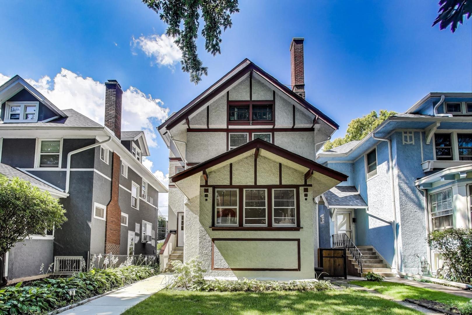 Great opportunity to establish roots in vibrant Rogers Park with this classic stucco beauty. Special features include a wider lot and flexible third floor space that would make an amazing primary bedroom or can be used as a family entertainment area or home office.  Open first floor boasts a front sunroom, gracious entry foyer, large sunny dining room off of the kitchen, powder room, and living room with decorative fireplace and built-in bookshelves.  The second floor features a three bedrooms (one currently used as an office) and a bath with separate tub and shower in remarkable vintage condition. The location is a walker's dream, with the beach, Metra, El, Loyola, Sullivan High School, Kilmer Elementary and shops and restaurants all just blocks away.  Fenced yard with gate and brick patio area for parking as well as outdoor entertaining. Owners prefer an as-is sale, although the house is well cared for and includes many updates such as new roof and gutters (2020-21), 200 amp electrical service, ductless mini-split air conditioning in primary bedroom and dining room, stucco repair, reverse osmosis water filter in kitchen, landscaping and new glass block windows in basement, new window in 2nd floor bath. Please present offers by 10 a.m. 9/7.