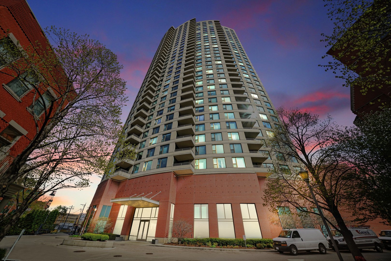 Rarely available corner 3 bedroom 3 bathroom residence in Kinzie Park Tower, located one of Chicago's ONLY private gated communities. Situated in between two of the city's most coveted neighborhoods, River North/Fulton Market, this floor plan provides the best the building has to offer featuring totally unobstructed 270 degree views to the East, South, and West. This home is finely detailed and offers a move in ready home for the most discerning buyer. The designer renovation features current finishes and exquisite selections throughout. Massive living & dining room with a wall of windows providing endless natural light and a large terrace (1 of 2!) to enjoy Chicago from above in your own residence.   Entertain your friends and family with ease in the open kitchen with island and built in bar/service area including oversized wine fridge. Upgrades include Hardwood flooring throughout, custom closets, beautifully finished laundry/utility room, custom lighting details and upgraded electrical, dry bar with wine fridge, and a second terrace.    The Kinzie Park community itself offers residents first-class amenities including gated entry, park-like grounds, the river walk, oversized outdoor pool, fully-equipped fitness center, a private dog park, free guest parking, bike storage, dry cleaners, on-site maintenance and management.  A true retreat in the heart of the city just steps from East Bank, Metra, Restaurant Row, River North, and easy accessibility to the expressway. Parking and additional private storage are available.