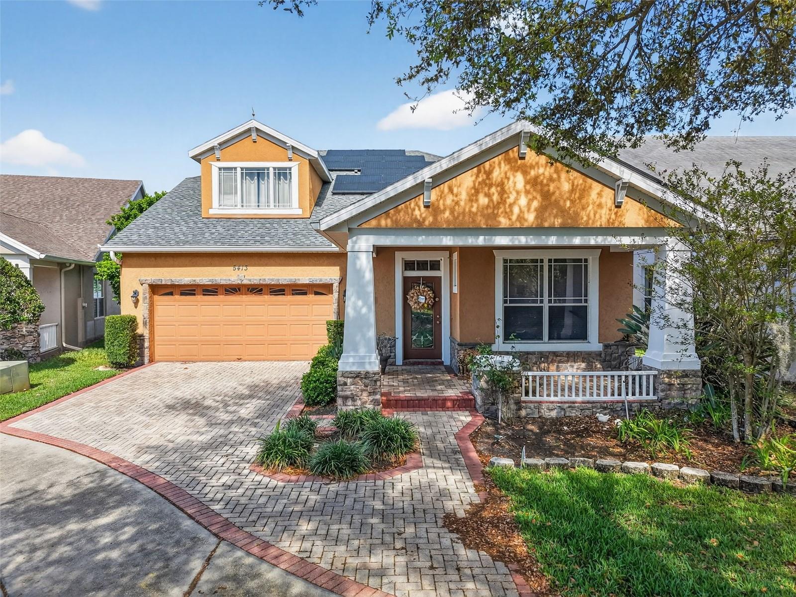 Discover the charm of this water front, 4 bedroom 3.5 bath home located in the desirable Summerport community. This unique property is nestled in the cul de sac for complete privacy. Enjoy scenic water views while relaxing poolside on the spacious screen enclosed lanai, which is also great for entertaining. The interior features granite countertops, stainless appliances, 42" cabinets, built in speakers on both levels and exterior. The community amenities include pool, fitness center, tennis courts, clubhouse, parks, dock, and walking paths. Conveniently located near theme parks, dining, and shopping.