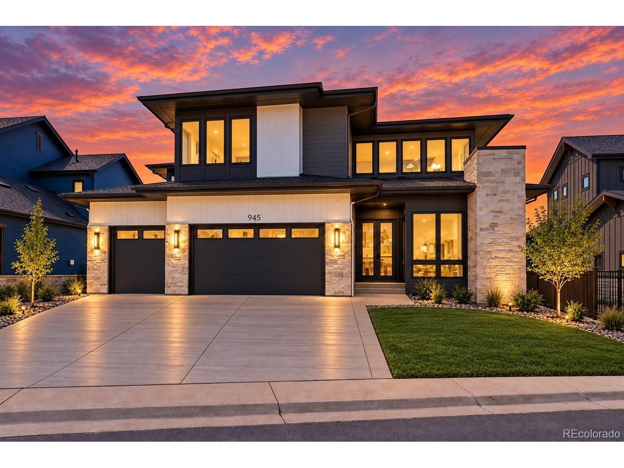 Welcome to an exceptional new-construction residence in Louisville's coveted Coal Creek Ranch, where elevated design, thoughtful craftsmanship, and effortless livability come together. Built by Sheffield Homes in 2026, this striking 5-bedroom, 5-bath home offers 4,466 finished square feet across three beautifully designed levels, with mountain and plains views as a memorable backdrop.The main level makes an immediate impression with wide-plank wood flooring, high ceilings, designer lighting, and an open layout created for sophisticated everyday living and entertaining. At its heart, the gourmet kitchen showcases custom cabinetry, quartz surfaces, a statement range hood, premium appliances, and an oversized waterfall island. The adjoining dining area features custom built-ins and opens through expansive glass doors to the outdoor living space, while the living room is anchored by a dramatic floor-to-ceiling gas fireplace. A main-level bedroom or office and designer 3/4 bath add exceptional versatility.Upstairs, the primary suite is a true retreat, complete with a private deck and a spa-inspired five-piece bath featuring dual vanities, an oversized walk-in shower with built-in bench, freestanding soaking tub, and generous closet space. Two additional bedrooms, beautifully finished baths, a versatile loft, and an impressive laundry room with extensive cabinetry and utility sink complete the upper level.The finished basement expands the experience with an oversized recreation room, guest bedroom, 3/4 bath, and flexible bonus space. Outside, enjoy covered patio and deck spaces, a private yard, and nearby greenbelt surroundings. The oversized finished 3-car garage includes EV-ready capability. Coal Creek Ranch amenities include a pool, clubhouse, parks, playground, tennis courts, and trails-all moments from the lifestyle and charm of Louisville. A remarkable opportunity to experience brand-new luxury, exceptional design, and Colorado living at its finest.