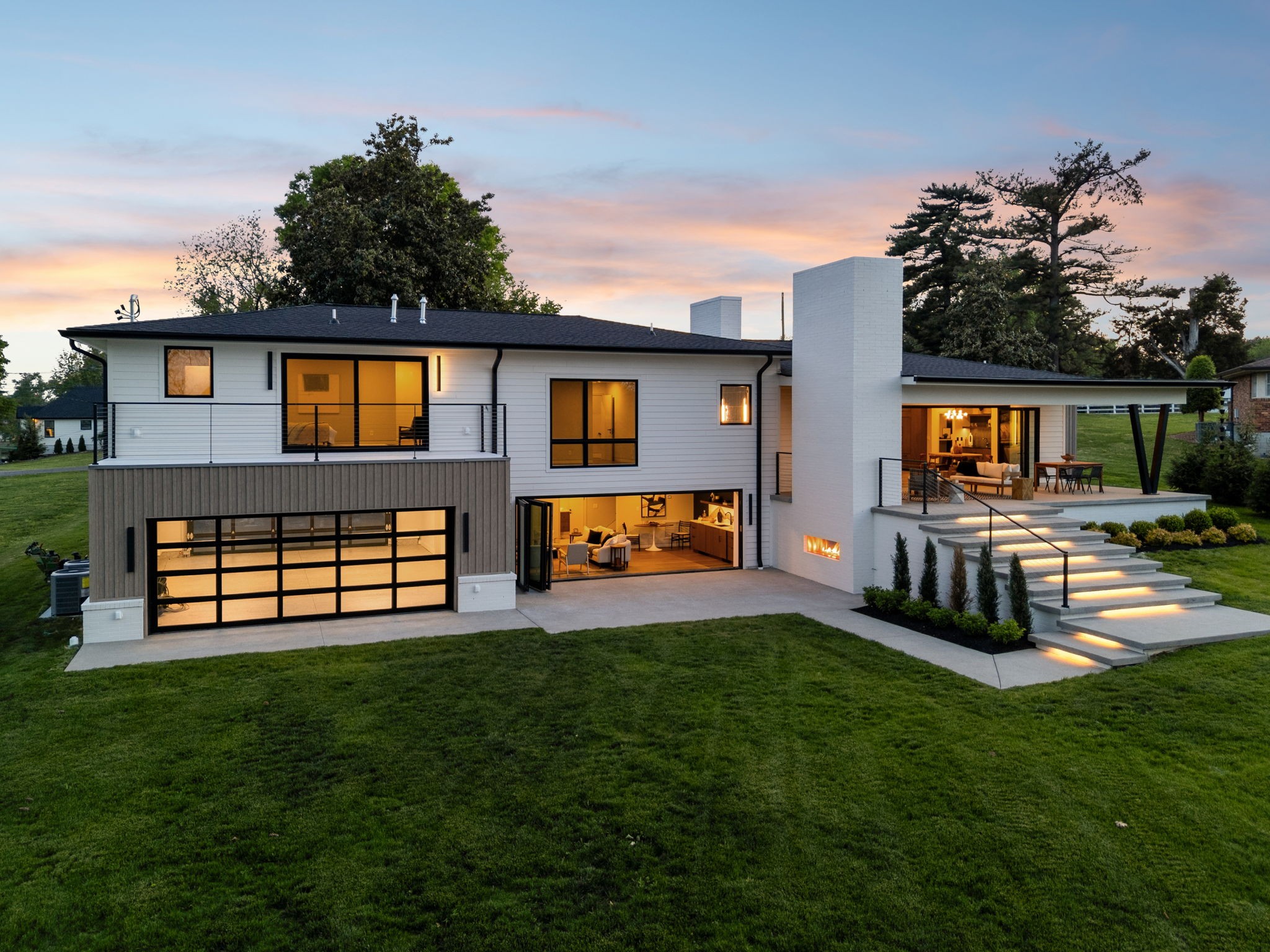 Tucked into one of Hendersonville’s most desirable lake-access pockets, 103 Walnut Drive is a rare jewel box where refined design meets effortless lake living. This fully reimagined contemporary home showcases striking mid-century influences, curated for buyers who value architectural detail, elevated finishes, and intentional living.From the moment you arrive, the clean lines and modern exterior set the tone for what’s inside—a thoughtfully designed interior featuring over $400K in custom millwork, wide plank flooring, quartz surfaces, designer tile, and a seamless flow ideal for both everyday living and entertaining. The chef’s kitchen is a true centerpiece, outfitted with Wolf appliances, a statement waterfall island, and custom detailing throughout. Smart home ready with Lutron pre-wiring for lighting and blinds, zoned Sonos audio, and multiple WiFi access points along with whole-home efficiency with three HVAC systems and spray foam insulation.Every space has been intentionally designed—from spa-like baths with heated floors and designer fixtures to en-suite bedrooms with walk-in closets—creating a home that feels both luxurious and livable.Beyond the walls, the lifestyle is what truly sets this property apart. Enjoy your private covered dock with hydro lift, electricity, and water—perfect for spontaneous days on Old Hickory Lake. The outdoor living experience continues with a covered patio featuring surround sound and a stained Douglas fir ceiling, plus gas and pre-wiring in place for a future pool.Located less than 5 minutes from multiple marinas, TailGate Brewery, and the iconic Moby Dicky’s, and just under 30 minutes to downtown Nashville, this home offers the perfect balance of retreat and convenience.This is more than a home—it’s a turnkey opportunity for those seeking modern design, lake access, and an elevated lifestyle in one of Middle Tennessee’s most sought-after waterfront communities.