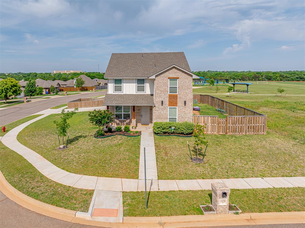 Location is everything, and this beautiful two-story home delivers! Perfectly situated on a corner lot just off Highway 9, you'll enjoy a quick commute to town, the university or the lake while backing directly to a stunning 6-acre park complete with pickleball, volleyball, basketball courts, plus a playground.Step inside to discover a thoughtfully designed home featuring quality finishes, an open and functional layout, and the space today's buyers are looking for. Every detail has been designed with comfort and convenience in mind.  The shed in the backyard stays too.This home offers 4 bedrooms, 3 full bathrooms, and a spacious bonus room.  A downstairs bedroom and full bath provide the perfect setup for guests or an office. Upstairs, you will find the additional 3 bedrooms and the bonus along with two more full baths for a grand total of 2350 sqft.Combining an unbeatable location, quality craftsmanship, a versatile floor plan, and outstanding neighborhood amenities, this home is close to perfect.
