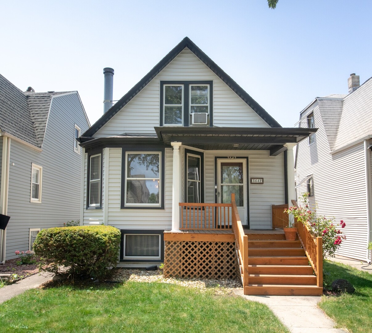 Step inside this inviting 4-bedroom, 2.5-bath home, full of historic charm!  A wood-burning fireplace, restored hardwood floors, and custom built-ins bring warmth and character throughout the main level.  The expansive kitchen offers granite counters, stainless steel appliances, and eating area.  Step in the large pantry for plenty of extra storage.  A full bath on the main level adds extra convenience along with three bedrooms.  The second level primary suite serves as a quiet retreat with exposed beams and skylights for nature light.  Step outside to enjoy the rear deck while overlooking the fenced backyard and detached 2-garage.  Don't miss this fantastic Irving Park location close to highways, transportation, restaurants, and shopping!