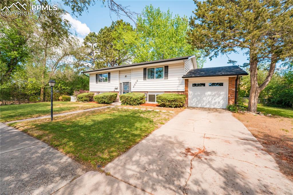 This five bedroom two bathroom home is located in the heart of Colorado Springs! Local coffee shops (STIR Coffee & Good Neighbors), restaurants, breweries and some of the best parks in town (Nancy Lewis & Bonforte) are all within walking distance! Rock Island Trail (perfect for biking, running, walking) is less than 1/8th of a mile away. Garden of The Gods and Downtown Colorado Springs are both also very close! Updated Kitchen | Real Hardwood Floors | Open Layout | New Vinyl Windows | New Class 4 Impact Resistant Roof | New AC | Newly Renovated Bathroom | Come see this one today before it's gone!