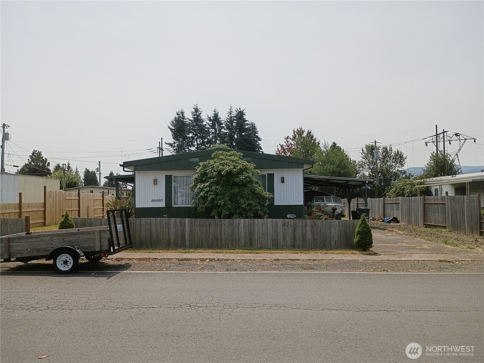 Plenty of room to move about in this spacious home, cabinets in dining room, separate living space off kitchen or second dining room. Home is fully fenced with the exception of the driveway entrance. Three bedrooms, bath off primary, on a large lot. Covered front porch, carport, living room, dining room, additional living space, shed, 20min to shopping, hospitals, multiple dining options. 1hr to the beach, mountains or the city.