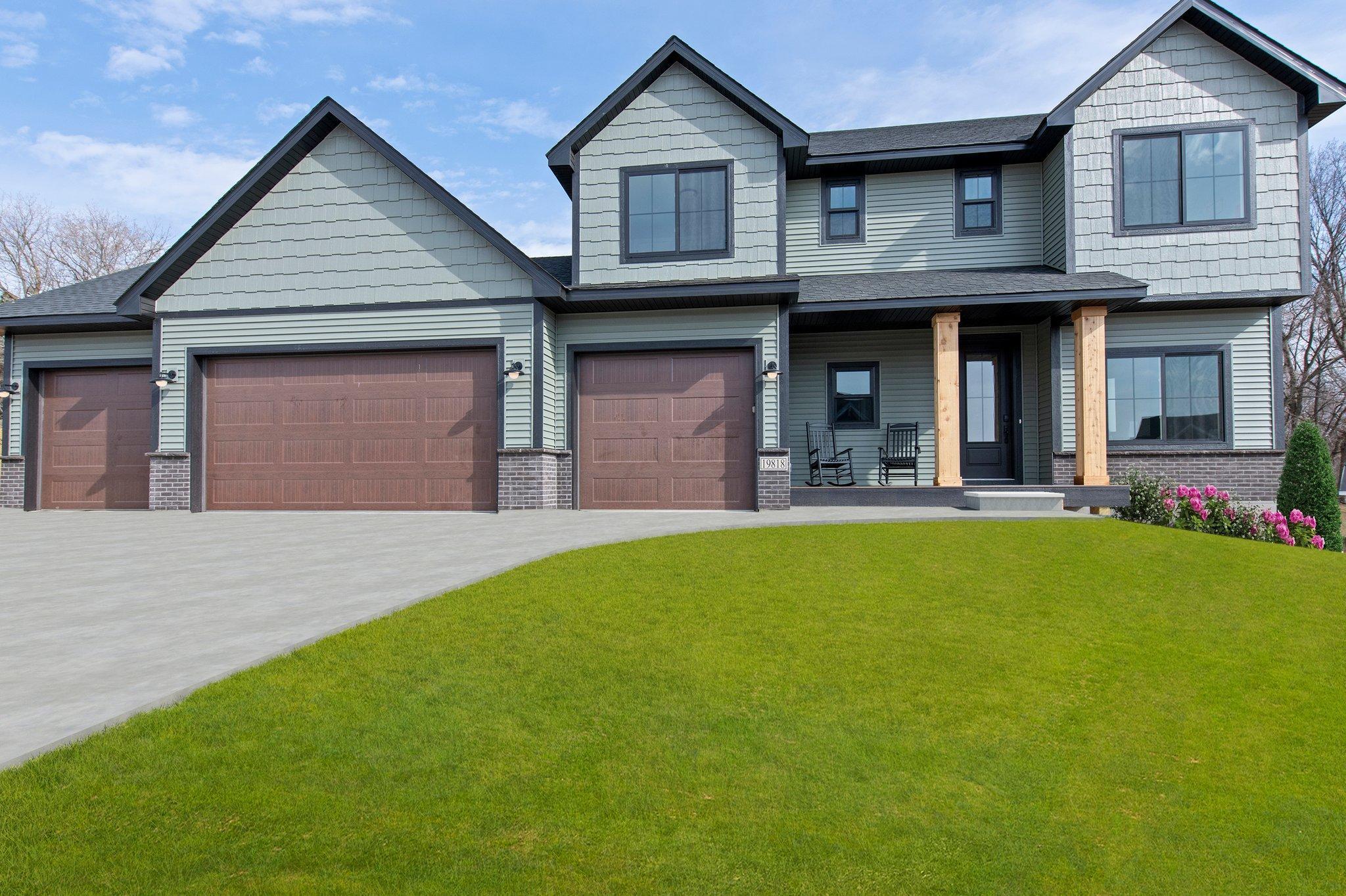 Experience luxury living at this stunning two-story home boasting a gourmet kitchen, five bedrooms, and an open-concept layout. The kitchen features a custom pantry complete with a convenient pass-thru grocery door, ample cabinetry, generous counter space and convenient layout for everyday living and entertaining. The great room offers a cozy gas fireplace creating a harmonious space for gatherings. Ascend to the luxurious owner's suite with a private bathroom and walk-in closet, while additional bedrooms and bathrooms cater to family and guests. The walk out lower level provides an entertainment zone with a family room, fifth bedroom, and bathroom, perfect for hosting movie nights and overnight guests.