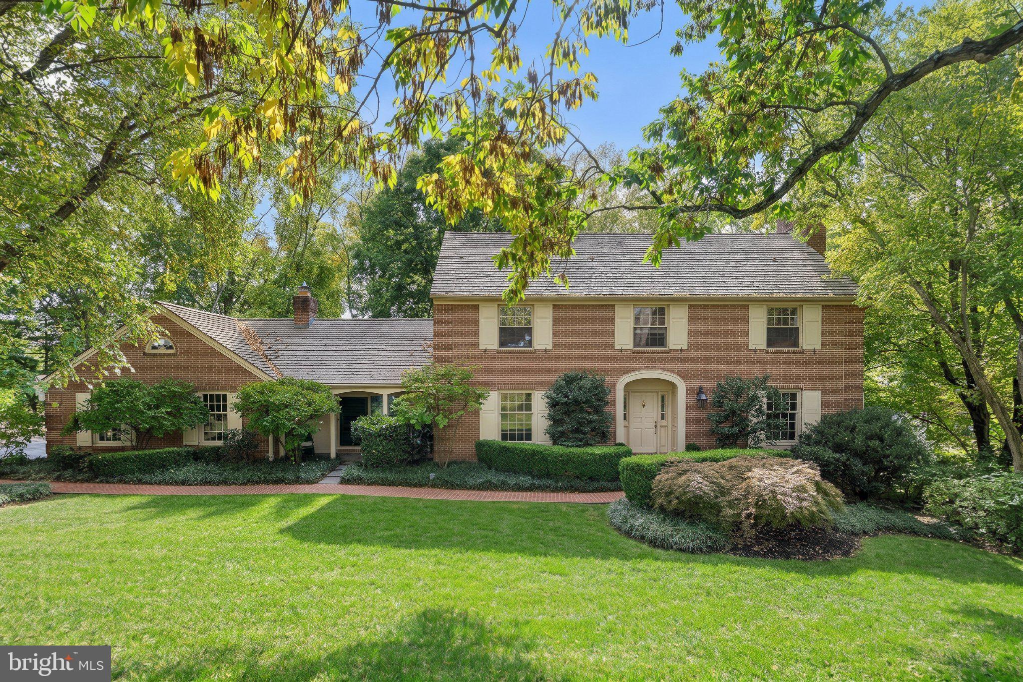 Welcome to 181 Hunt Valley Circle, an elegant 4/5-bedroom home nestled on 1.4 picturesque acres in a private, serene setting in Berwyn. Beautifully maintained and extensively improved, this exceptional property offers four spacious bedrooms upstairs, plus a versatile fifth bedroom option and full bathroom in the spectacularly renovated walk-out lower level. Blending timeless charm with modern functionality, the home has benefited from over $200,000 in improvements by the current owners, including an impressive $150,000 lower-level transformation and conversion to public water and sewer in 2020.A long, private driveway framed by stately brick pillars creates an impressive arrival, setting the tone for this beautiful property. Surrounded by mature landscaping and lush greenery, the grounds offer a peaceful, park-like setting complete with a pond and waterfall in the backyard. Expansive, tiered decks with Brazilian wood railings overlook the stunning rear grounds, while a lower brick and flagstone patio provides another inviting space for outdoor entertaining or quiet relaxation. A cedar-fenced lawn area and thoughtfully landscaped gardens enhance the sense of privacy, creating an idyllic retreat just minutes from everything the Main Line has to offer.Inside, a welcoming foyer with slate flooring and classic moldings sets the tone for the home's timeless elegance. The formal living room features hardwood floors, beautiful millwork, and a wood-burning fireplace, while the adjoining dining room offers picturesque views of the surrounding grounds. A private study overlooking the front property provides an ideal work-from-home retreat, and a recently renovated powder room completes this inviting space.At the heart of the home is the updated kitchen, featuring quartz countertops, a center island, stainless steel appliances, including a Wolf induction cooktop, and two spacious pantry closets with custom shelving. A sun-filled breakfast area overlooks the rear deck, while the adjoining family room is anchored by a striking stone wood-burning fireplace. Two sets of sliding doors, replaced with ProVia doors in 2020, provide access to the front patio and rear deck, creating a seamless connection between indoor and outdoor living.A spacious mudroom with an additional powder room, laundry area with cabinetry, utility sink, and quartz countertops offers convenience and direct access to the attached two-car garage.Upstairs, four generously-sized bedrooms and two full bathrooms provide comfortable accommodations. The primary suite features a beautifully appointed en-suite bath with double vanities, a tiled shower, heated towel rack, and walk-in closet.The spectacular finished walk-out lower level is truly an extension of the home's living space. Completely gutted and reimagined in 2021, this impressive space was thoughtfully designed for both entertaining and everyday living. Featuring beautiful custom built-ins, a bar area, wine storage, spacious recreation area, an additional bedroom, and newly added full bath, the lower level offers incredible versatility. With direct access to the outdoors, it's an ideal setup for overnight guests, extended family, or simply enjoying another level of beautifully designed living and entertaining space.Beyond the beautiful interiors, the home has benefited from substantial improvements and ongoing care. The property was converted to public water and sewer in 2020 and the audio-visual wiring was updated to support a lower level and outdoor sound system. The home’s beautiful cedar shake roof comes with an existing lifetime warranty, subject to required maintenance, that’s transferable to the new owners.Tucked away in a peaceful, sought-after community, this beautifully maintained home offers the perfect balance of privacy and convenience. Located near Ellis Preserve, Episcopal Academy, Whole Foods, and the charming downtowns of Wayne and Paoli, Hunt Valley Circle is a wonderful place to call home.