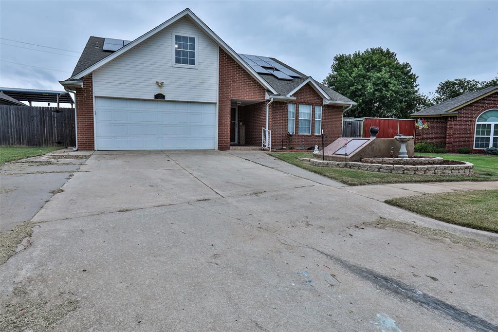 This 4 bedroom home has great space for everyone in the family to enjoy!  Home features repainted living room with new flooring, updated paint in the kitchen with gas stove along with plenty of cabinet and counter space.  Master suite (located downstairs) contains separate tub and shower along with his/her closets.  Upstairs features 3 secondary bedrooms and hall bathroom.  Also, upstairs has large bonus room,  ideal for a game room or extra living room.  Outdoor amenities include huge covered patio, TWO storm shelters (one is an Oz Safe Room) & solar panels.  Also, NO NEIGHBORS behind you.   Minutes away from a number of shops, restaurants and I-35.  Schedule your private showing today!