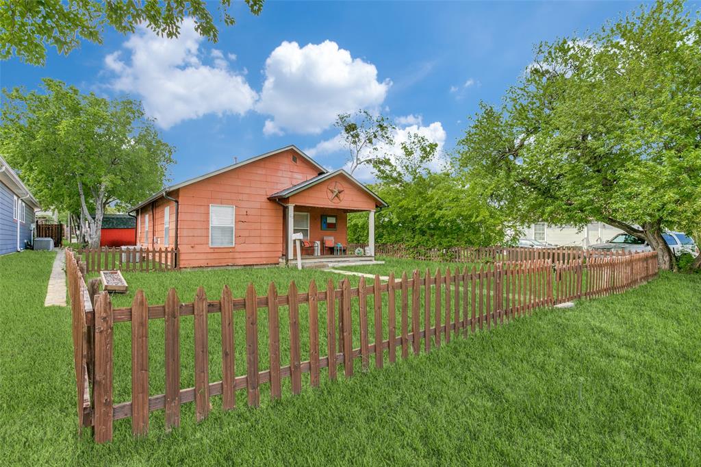 Priced for land value, and conveyed in as-is condition, this property presents an exceptional opportunity in the heart of Grapevine's Historic Township. Just steps from Historic Main Street, you'll enjoy effortless access to the city's renowned boutiques, dining, festivals, and entertainment. Located only minutes from Grapevine Lake, outdoor enthusiasts can enjoy the perfect balance of vibrant downtown living and year-round recreation. Zoned to highly regarded GCISD schools—Cannon Elementary, Grapevine Middle School, and Colleyville Heritage High School—and within walking distance of the Grapevine Faith campus, this one-story is ready for its next chapter. This 2-bedroom, 1.5-bath home at 612 E Wall Street offers a rare opportunity to own within one of the area’s most sought-after districts.  A spacious front porch sets the tone with classic Southern appeal, perfect for morning coffee or relaxing evenings. Inside, the home features an open, light-filled layout with a blend of original character and prior updates. The kitchen includes gas appliances and functional space for everyday living or entertaining, while the two bedrooms provide comfortable retreats. The fully fenced front yard adds usability for pets or outdoor enjoyment. Priced with condition in mind, the home presents an excellent opportunity for a buyer to make desired upgrades and improvements. Please note, the foundation requires repair, which has been factored into the pricing—making this an ideal option for those looking to invest in and personalize a home in Historic Grapevine.