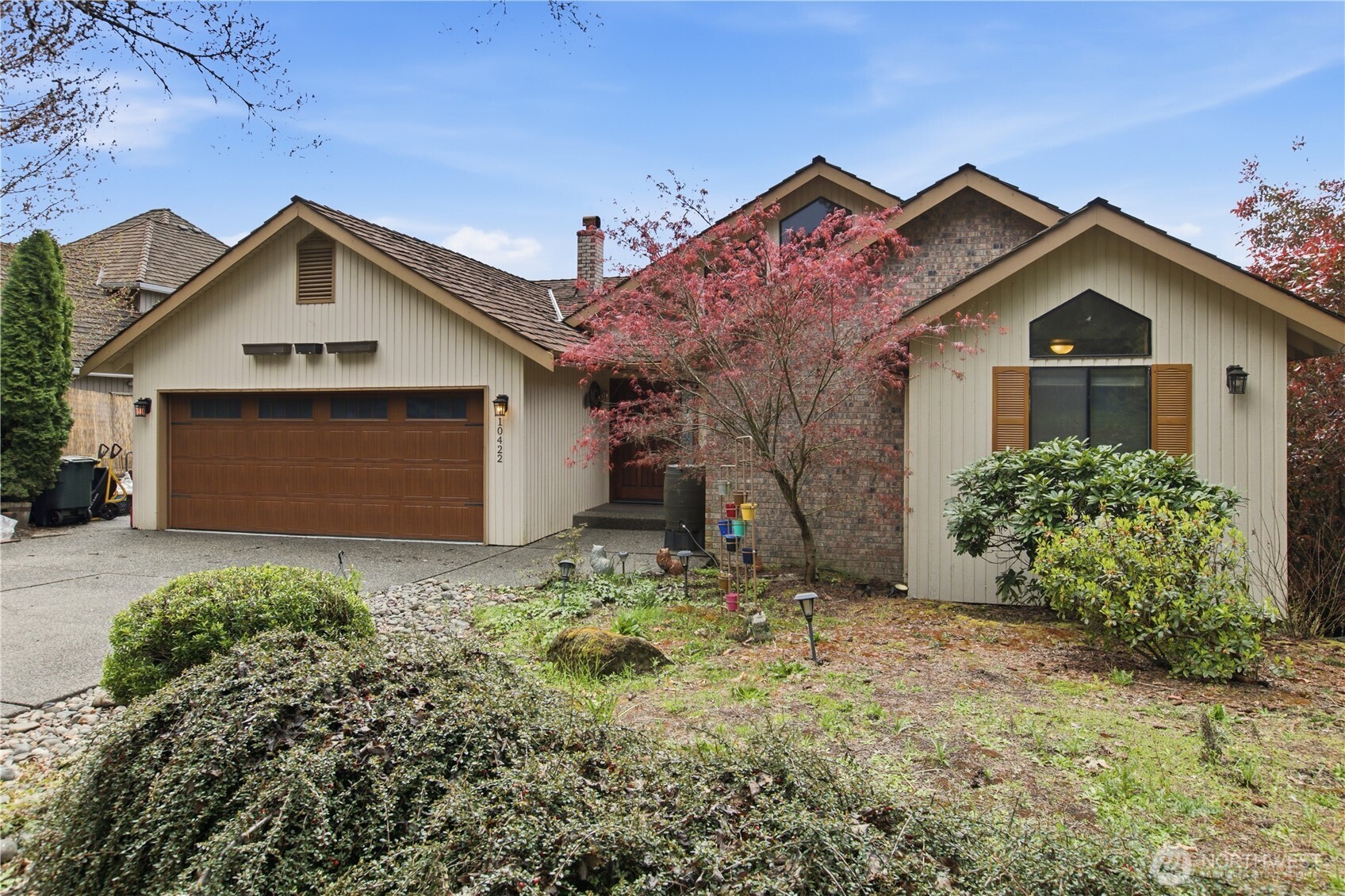 Gorgeous custom VIEW home w/full lower level MIL! Light bright great room w/wood stove, wall of windows, formal dining area & beautiful kitchen w/Corian counters & bar seating. Master suite has private access to rear deck, luxurious updated bathroom, barn door, heated tile flooring, & custom walk-in closet. Huge lower level living area complete w/great rm, kitchen, 2 bdrms & full bath. Plenty of parking, Electric Vehicle plug in, New furnace with central A/C, enormous deck, excellent for entertainment, Great location.