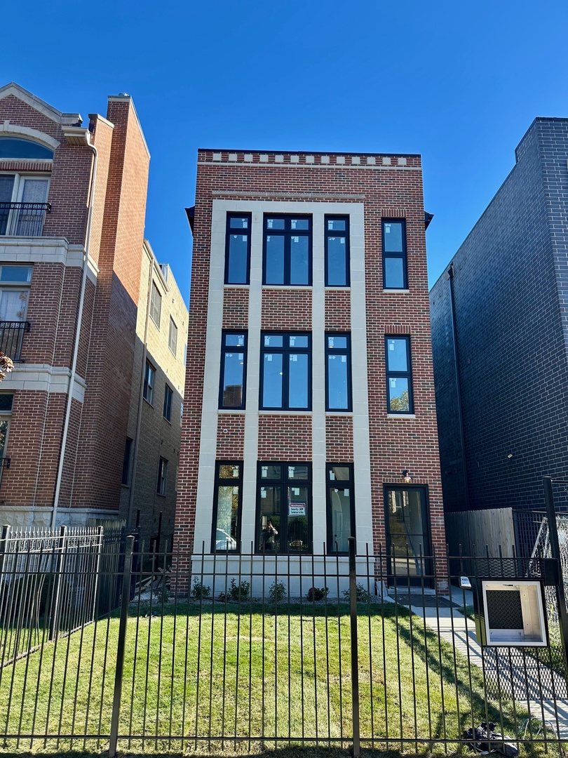 Stunning New Construction with State of the Art finishes Delivering in 60 Days!   The units are spacious and bright , the top floor has amazing vaulted ceilings with exposed beams for an architectural statement and a sense of Drama! Each of the units is a 3 bedroom 2bath with independent mechanicals and so you have separately metered electricity, heat and cooking gas. Each unit also has an independent hot water tank, circuit breaker panel in unit for easy access. All systems are high efficiency and professionally installed. Each of the units features oak hardwood flooring, a mixture of White  shaker style cabinetry in the kitchens & baths, Quartz countertops and hand selected backsplashes, Stainless Steel appliances, and lots of storage. The primary bedrooms are set up as en-suites with dual vanity sinks, oversized walk-in showers with glass enclosures, hand selected highly polished or matted oversized wall tile, scaled shower floor tile, and a variation in the beautiful bathroom floor tile. Each of the other bedrooms is spacious with plenty of closet space, and direct access to a hallway bath. There is in unit laundry for each of the units. The location here is unbeatable with effortless access to the areas amenities. The property is just a short commute to the University of Chicago, the Lake etc.   NOTE: These images are of a past project by this developer. We are nearing the dry wall stage now. Delivery in 90 days or less!