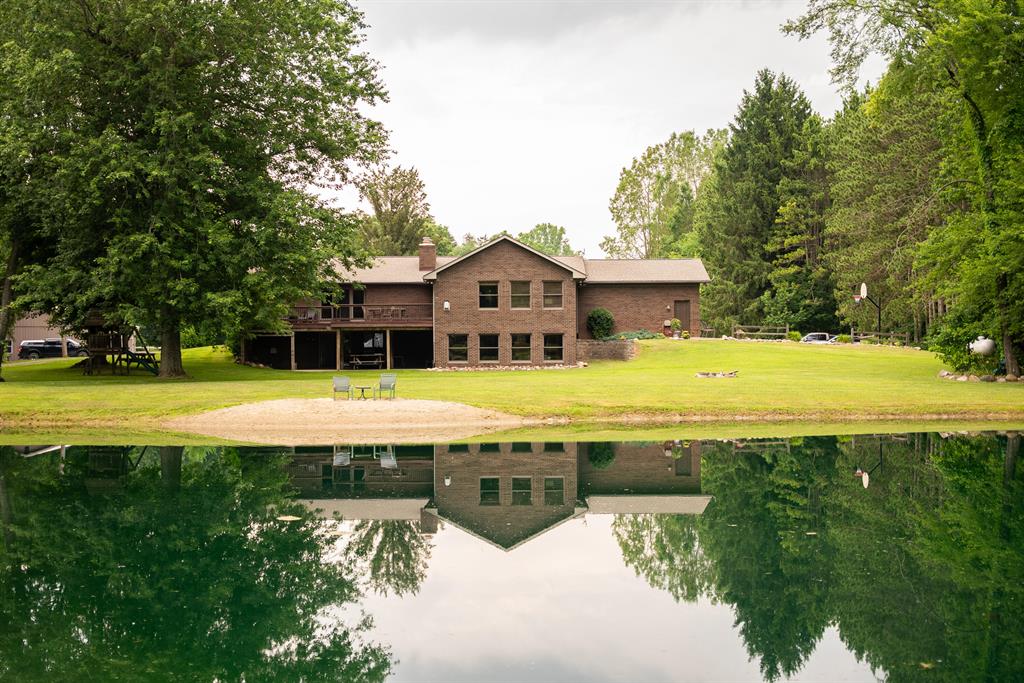 For the discerning equestrian buyer seeking serenity, space, and versatilitythis exceptional 41.98-acre estate is your dream come to life. Located just minutes from I-96 with convenient access to Lansing, Ann Arbor and Metro Detroit, this one-of-a-kind property blends upscale rural living with endless potential for both horse enthusiasts and outdoor lovers alike.

At the heart of the property is a meticulously maintained all-brick ranch home offering more than 4,000 square feet of finished living space. With four bedrooms, three full bathrooms and four fireplaces (located in the office, living room, family room and lower level), the home exudes warmth, character and classic charm. Natural light pours into every room through large windows and multiple doorwalls, providing scenic views of pastures, woods and wildlife.

The gourmet kitchen is a standout, featuring granite countertops, updated cabinetry and modern appliances - perfect for preparing family meals or hosting gatherings after a ride on the trail. The home also includes a fully finished walkout lower level, ideal for guests or multigenerational living, complete with in-law quarters and a well-appointed fitness room that overlooks the landscape.

For the equestrian buyer, this property offers a rare blend of functionality and natural beauty. More than half an acre of fenced horse pasture is ready for your animals, supported by a well-constructed 42' x 50' horse barn equipped with three spacious stalls, tack space and room for hay storage or equipment. There's ample room to expand paddocks or add an arena, while the gently rolling terrain, mature timber and open meadows provide the ideal setting for trail riding and pasture rotation. Quiet and private, the setting is perfect for daily training, weekend escapes, or simply enjoying the connection between horse and land.

Winding trails meander through the hardwoods, inviting long rides under the canopy or peaceful hikes on foot. Multiple hunting blinds are in place and the land has been expertly managed for