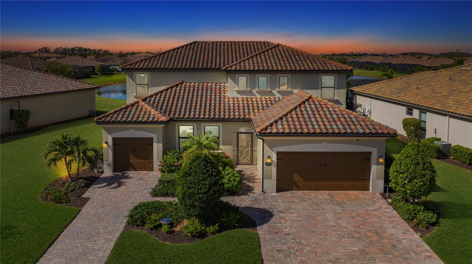 Virtually Staged. Exceptional Six-Bedroom Home with Private In-Law Suite in River Strand. Welcome to 6771 Wild Lake Terrace, where space, comfort, and the Florida lifestyle come together in one truly special home. Tucked within the beautiful River Strand Country Club community, this impressive six-bedroom, four-and-a-half-bath residence offers room to gather, room to entertain, and best of all room for everyone to have a place of their own. From the moment you arrive, you'll discover a home designed to make everyday living comfortable, easy, and enjoyable.The standout feature is the true private in-law suite, thoughtfully designed for extended family, in-laws, guests, or anyone who values having a seperate space within the home.Located on the first floor, the in-law suite features its own private entrance, private garage, kitchen, dining area, and living space, creating an incredibly comfortable and private retreat while remaining connected to the main home. It’s a rare and thoughtfully designed space that offers loved ones or guests the comfort, privacy, and independence of having a place of their own all under one roof.The main home offers an expansive open-concept layout with generous living and dining areas and an abundance of space for family and entertaining. Five spacious bedrooms are located upstairs, providing privacy and comfortable accommodations for family and guests. The exceptionally large kitchen and dining areas offer plenty of room to gather, entertain, and enjoy everyday Florida living.Located within River Strand Country Club, residents enjoy an outstanding resort-style lifestyle with beautifully maintained grounds and an impressive collection of amenities. The community's recent master-planned improvements have re-envisioned its three nine-hole golf courses and enhanced the overall club experience. Residents can enjoy golf, tennis, pickleball, multiple pools, fitness facilities, dining, social activities, and the popular Tiki Bar.There is also plenty for families and younger residents, with recreational areas and activities including basketball, a soccer wall, tennis, pickleball, golf, and youth programs. Whether you're an avid golfer, want to improve your tennis or pickleball game, or simply enjoy an active social lifestyle, River Strand offers something for virtually every generation.The location adds another layer of convenience. You'll be close to an ever-growing selection of restaurants, shopping, and everyday conveniences, including Costco, Home Depot, Seasons 52, Chick-fil-A, UTC Mall, and much more. Downtown Sarasota and the Gulf Coast's beaches and attractions are easily accessible, while Sarasota-Bradenton International Airport makes travel convenient for owners and visiting family and friends.Whether you're searching for a full-time Florida residence, a seasonal getaway, or a home with potential rental opportunities subject to community restrictions, this property offers an exceptional combination of space, privacy, recreation, and location.Come for the sunshine. Stay for the lifestyle. And discover what makes 6771 Wild Lake Terrace such a special place to call home a six-bedroom River Strand residence with a private in-law suite that truly feels like a home within the home.Some rooms have been virtually staged to illustrate potential furnishings and design possibilities. Virtually staged photographs are identified accordingly.