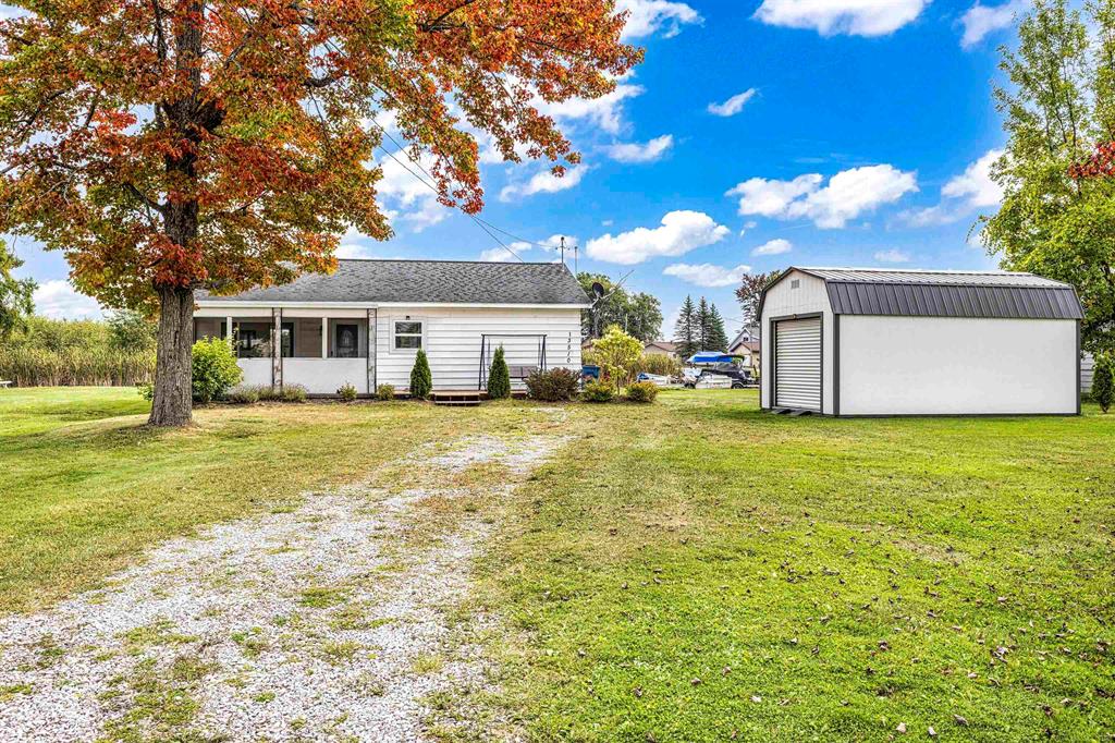 Escape to waterfront living with this 1BR, 1BA home plus multi-purpose room that can serve as a 2nd bedroom. Boasting 100 ft of canal frontage on Houghton Lake and situated on a spacious double lot, there's room to park an RV, add a pole barn, or simply enjoy the outdoor space. Your boat is just 30 ft from the back door, with quick access to the lake. Conveniently located within walking distance to a bar/restaurant and just 5 minutes from shopping and nightlife. Enjoy evenings under the stars with family and friends. Affordable waterfront opportunities like this are rare-don't miss it!