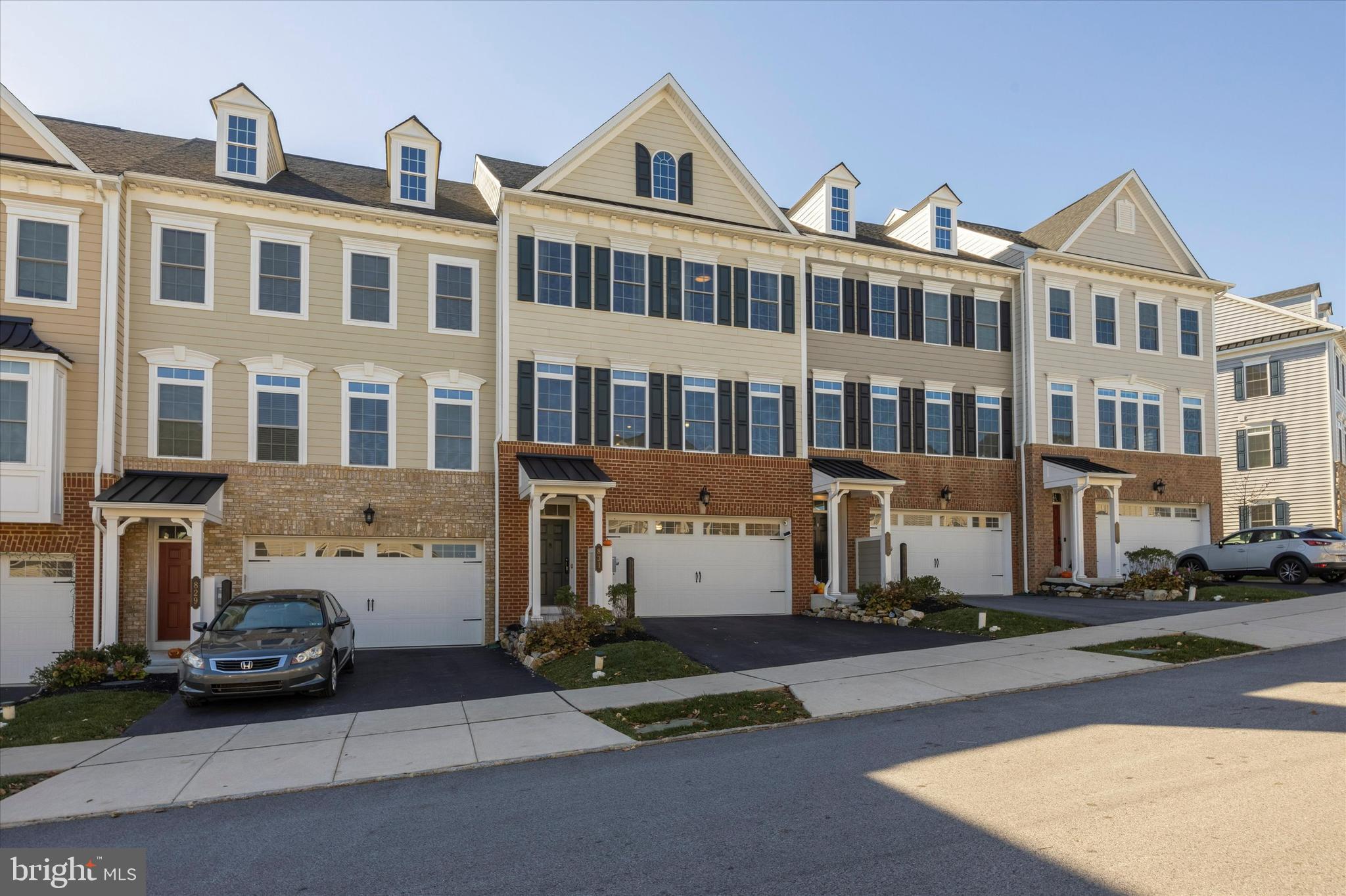 EXCELLENT 2019 BUILD IN ATWATER / GREAT VALLEY SCHOOLS! Welcome to 831 Stonecliffe, a stunning residence in the highly sought-after Atwater community. This sun-drenched, open-concept home is in excellent condition throughout, featuring a gourmet kitchen with white cabinetry, granite countertops, gas cooking, and an oversized island that comfortably seats six. The main level boasts beautiful hardwood flooring through the dining and family rooms, where dual sliding doors lead to an expansive deck perfect for entertaining. Upstairs, the spacious primary suite offers a walk-in closet and an upgraded en-suite bath with a double vanity. Two additional bedrooms, a hall bath, and a convenient second-floor laundry room complete this level. The massive, sun-filled walk-out basement features large windows and a French door to the backyard. Enjoy a low-maintenance lifestyle with HOA-covered lawn care and snow removal. Ideally located within walking distance to Wawa and minutes from Wegmans, Vanguard, Paoli Hospital, 202, and King of Prussia.