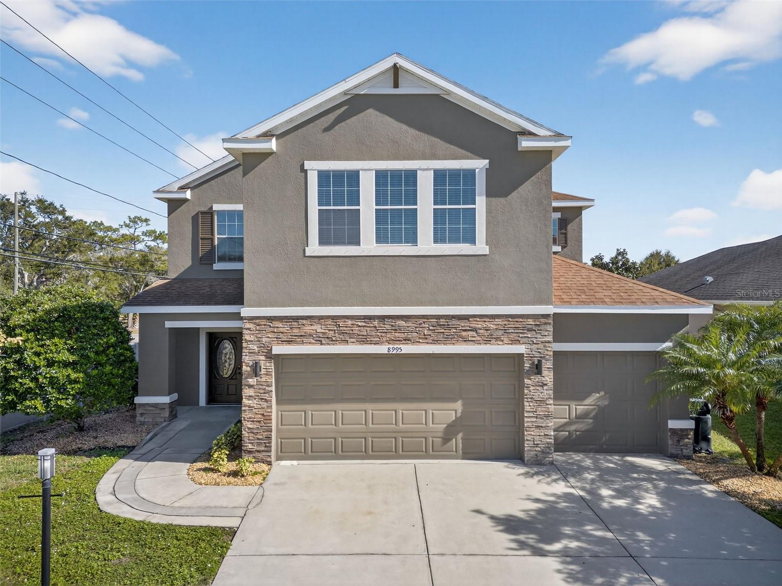 Welcome to your dream home in the sought-after Bayou Cove, Tampa Bay! Built in 2013, this beautiful residence features 5 spacious bedrooms, 4 bathrooms, and a versatile office/den, all within a functional split-plan layout and complemented by a 3-car garage. Perfect for both relaxation and entertainment, featuring almost 3,100 sqft of living space. The heart of this home is the large, with new appliances and opens to the family room. Upstairs, discover 5 oversized bedrooms, including an inviting primary suite complete with cozy sitting area - a quiet sanctuary for busy homeowners. Recent upgrades include new kitchen appliances, updated bathrooms, freshly painted interior and exterior, ensuring comfort and curb appeal. This stunning home offers exceptional comfort and peace of mind in flood zone X. Ideally located with quick access to Park Blvd, US-19, and I-275, you’ll be just minutes from Tampa, Clearwater, St. Petersburg, and the beaches. Contact us today to schedule your private showing