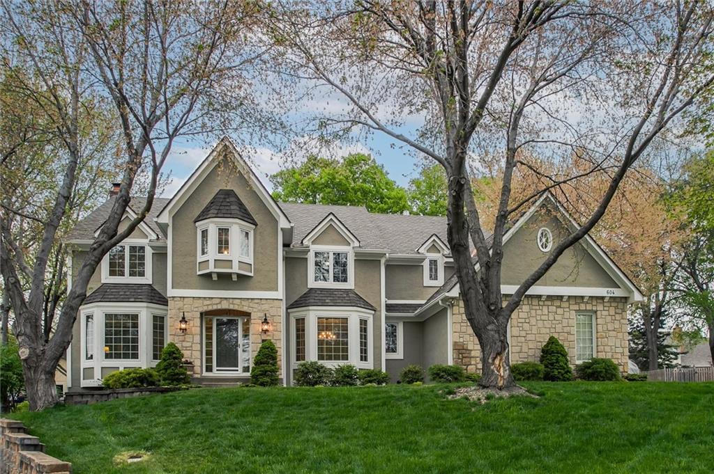 This luxurious, custom built home - located on a really nice cul-de-sac lot in Lakewood, will not disappoint! The main level has beautiful crown molding throughout and is very spacious with a separate office, formal dining, large living room, and a cozy hearth room open to a gorgeous custom remodeled kitchen with a large island, farmhouse sink, dual ovens, beautiful granite tops, and large windows bringing in natural light! The screened in porch is located right off the kitchen and is perfectly sized for entertaining! Upstairs, the primary suite has a sitting room with a fireplace and built-in shelving, an updated bath with heated floors, custom built-in cabinetry with a laundry shoot, and a very large walk-in closet! Second bedroom is an ensuite with full bath, walk-in closet, and additional laundry shoot, Third and Fourth Bedrooms have a Jack & Jill bath - each having private vanity areas and walk-in closets. The lower level walk-out is fully finished with a wet bar, fireplace, and half bath. The good sized storage/workshop area has a built-in wood working dust vacuum system. ADDITIONAL FEATURES: Pella Windows, 95% efficiency HVAC with anti-bacterial filter system, 50 year composite roof, James Hardy cement board siding, R-60 attic insulation, whole-house humidifier, central vacuum, Epoxy coated garage floor, sprinkler system. This home has been meticulously maintained by the original owner since the house was built!