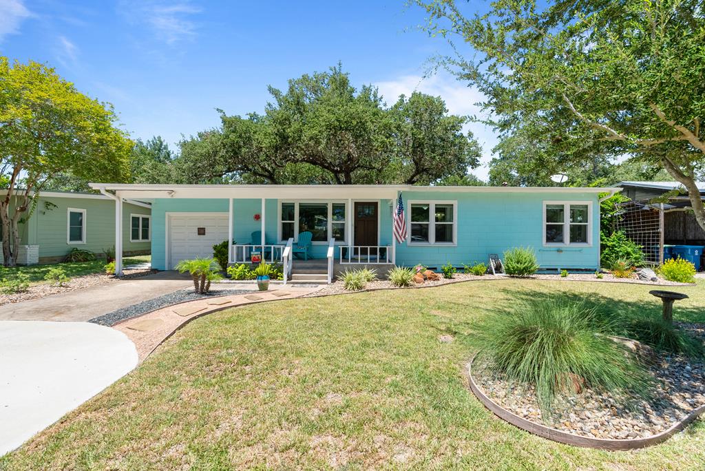 Charming Coastal Retreat with Oversized Yard & Upgrades Galore! Welcome to this adorable 3-bedroom, 2-bath coastal home nestled beneath majestic oak trees on an oversized lot. As you enter, you're greeted by a stunning oversized picture window that perfectly frames the expansive backyard—filling the home with natural light and offering serene views year-round. Enjoy laid-back coastal living with a spacious screened-in porch—ideal for morning coffee or relaxing evenings. The updated kitchen features premium KraftMaid soft-close cabinetry, and new double-paned Pella windows throughout offer durability and energy efficiency. Inside, you'll love the custom built-ins and cabinetry in both the laundry room and the third bedroom, which also works beautifully as a home office. The lush yard includes a full sprinkler system and a large Tuff Shed for added storage. The extended driveway offers parking for up to 3 vehicles. This move-in-ready gem offers comfort, charm, and functionality in a peaceful coastal setting—just minutes from everything you need!