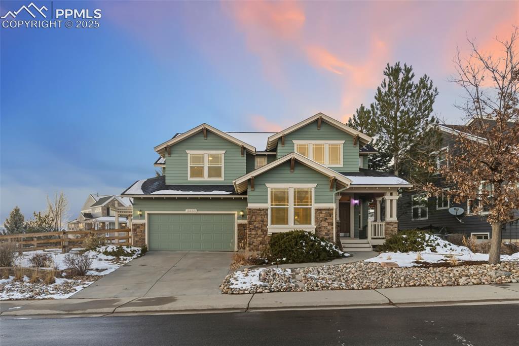 This thoughtfully designed residence showcases the elevated finishes, craftsmanship, and attention to detail that only a model home can offer. The main level welcomes you with abundant natural light, a bright open layout, and freshly refinished real hardwood floors that add warmth and character. The carpeting throughout the home has been professionally cleaned and is a higher-grade upgrade from the original builder standard, contributing to the home's polished and comfortable feel. Crown molding in several rooms, upgraded trim, built-in speakers, and designer touchpoints further elevate the interior. The kitchen offers generous prep and storage space and features a new KitchenAid refrigerator, seamlessly connecting to the home’s light-filled living and dining areas. The finished lower level includes a full kitchenette, creating a perfect retreat for guests, in-laws, long-term visitors, or multi-generational living. A large storage area ensures space for every season of life. One of the most exceptional features of this home is the insulated, independently climate-controlled bonus room accessed through the garage—complete with its own heating and cooling. Ideal for a home gym, workshop, art studio, music room, office, craft space, or any specialized hobby, this rare addition sets the property apart in a remarkable way. Dual furnaces, a main-floor office, upgraded finishes throughout, and a spacious backyard add to the home’s versatility and comfort. And beyond the property itself, The Meadows offers a wonderful lifestyle: miles of trails, parks, easy access to the Castle Rock Outlets, nearby shopping, dining, and charming downtown Castle Rock—all just minutes away.Rich with model-home upgrades, flexible spaces, and special features rarely found together, this home is truly one of The Meadows’ sweetest offerings.