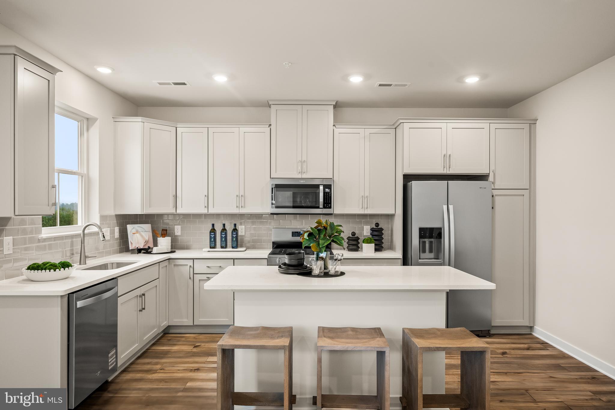 Start 2026 in a fresh, modern 3 BR, 2.5 BA townhome at Phoenixville Heights! Discover a stylish new community just minutes from vibrant downtown Phoenixville, with direct access to the scenic Schuylkill River Trail — perfect for walking, biking, and weekend adventures.826 Graphite Drive showcases the popular Piper floorplan, designed for low-maintenance living with smart layouts and on-trend finishes throughout.The entry level welcomes you with a bright foyer and convenient inside access from the garage.On the main level, enjoy an airy open layout connecting a spacious Great Room with a sleek, modern kitchen. You’ll love the stainless steel counter-depth side-by-side refrigerator, quartz countertops, upgraded cabinetry, and glossy designer backsplash — all among the most sought-after upgrades already included. The dining area opens to a composite deck with white vinyl rails, perfect for relaxing or entertaining.Upstairs, all three bedrooms offer comfort and privacy. The owner’s suite features its own private bath, while secondary bedrooms provide flexible space for guests, a home office, or hobbies. Additional highlights include stained oak stairs with painted risers and an optional first-floor powder room for extra convenience.A roomy garage with inside access completes this well-designed home, blending style, functionality, and a fantastic lifestyle-focused location.And for pet lovers? Phoenixville Heights features a charming community dog park, making it an ideal spot for homeowners who want a low-maintenance home and space for their pups to play. Move-in ready, beautifully finished, and close to everything Phoenixville has to offer — don’t miss your chance to make this your next home!Note: Model homes now ready to tour! Prices, dimensions, and features may vary and are subject to change. Photos are for illustrative purposes only - please see new home consultant for final options and finishes. If you’re working with a Realtor, please ensure they are acknowledged as your representative during your first interaction with Lennar and accompany you on your first visit. Taxes are assessed after settlement. Please visit the sales trailer for open house access.