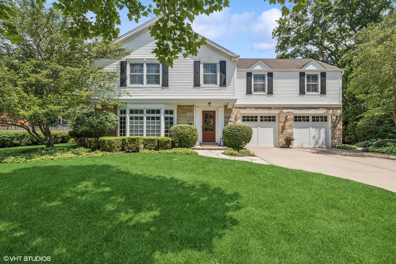 Welcome to 423 S Beverly Lane in Arlington Heights,-a beautifully updated and spacious home in the heart of the desirable Scarsdale neighborhood. This classic residence blends timeless character with modern comforts, offering over 4,200 square feet of thoughtfully designed living space. Featuring four generously sized bedrooms and three and a half bathrooms, the home is ideal for both everyday living and entertaining. The main level includes a warm and inviting living room leading to stylish large formal dining room. The well appointed great room boast a large window seat, custom built-ins and gas fireplace. A gourmet kitchen outfitted with stainless steel appliances and a sun-filled eating area overlooking the backyard. The upper level has large master suite separated from the three remaining bedrooms.  A finished basement provides flexible space for a recreation room, home office, or gym, while ample storage and a two-car attached garage add convenience.  Outside, the professionally landscaped yard offers a charming retreat with plenty of space for gatherings or relaxing evenings at home. Located just minutes from downtown Arlington Heights, this home is close to Metra, parks, restaurants, and shopping. Families will appreciate the top-rated schools-Dryden Elementary, South Middle, and Prospect High School-all within close proximity. With a blend of historic charm, updated amenities, and a prime location, 423 S Beverly Lane is a rare find in one of the northwest suburbs' most sought-after communities. Welcome Home!