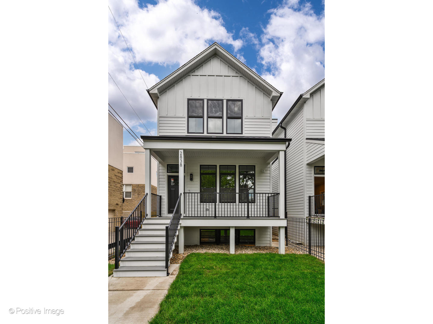 Welcome to this stunning new-construction, 5-bedroom, 3.5-bath single-family home in the heart of West Lakeview. Nestled on a picturesque, tree-lined street, it showcases an inviting layout and stylish finishes throughout. Tall ceilings and gleaming hardwood floors fill the home with light and create a bright, open feel. Step past the charming front porch into the main level, where the living and dining areas flow seamlessly into a generous chef's kitchen with a large island, pantry, and abundant cabinet space. Just beyond, the family room opens to a paved back patio-perfect for entertaining. A powder room, coat closet, and two fireplaces add comfort and convenience on this level. Upstairs, the primary suite features soaring ceilings, a spacious closet, and a spa-like bath with a soaking tub and separate shower. Two additional bedrooms, a full bath, and side-by-side laundry provide everyday ease. The finished basement offers even more living space, including a large family room, two additional bedrooms, a full bath, wet bar, side-by-side washer and dryer, and extra storage. Outside, a two-car garage with a rooftop deck creates the ultimate spot for summer entertaining. Located steps from top shopping and dining, Midtown Athletic Club, Target, Costco, and Fresh Thyme-with easy expressway access-this home delivers style, space, and convenience in an unbeatable West Lakeview location. Pictures are from past project of same developer. 10 month delivery and buyers can still customize.