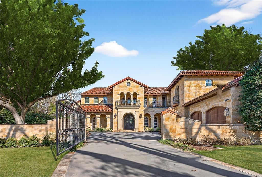Located on a beautifully landscaped, gated lot of approximately 0.622 acres in coveted Old Preston Hollow, this Mediterranean-style estate offers exceptional scale, privacy, and resort-style living. The expansive 108' x 249' lot features five bedrooms, six full baths, three half baths, and a three individual bay car garage with motor court.The main level is designed for elegant yet functional living, with an open, flowing floor plan that accommodates both formal entertaining and everyday comfort. Spaces include refined formal living areas, a private library or office, a formal dining room and multiple interconnected gathering rooms.The gourmet chef’s kitchen serves as the heart of the home, highlighted by dramatic 21-foot ceilings, commercial-grade appliances, an oversized island, and a full bar with a wine room. It opens seamlessly to the keeping room and family room, creating a natural hub for entertaining and daily living.The first floor includes the primary suite and a guest suite, all with en-suite baths. The primary retreat offers a private sitting room with fireplace, dual spa-like bathrooms, and two expansive walk-in closets. Upstairs, three additional en-suite bedrooms are joined by a large game room with private balcony and a dedicated fitness room.Outdoor living is a standout feature, with approximately 2,000 square feet of covered spaces, multiple terraces, and two covered patios. The resort-style backyard includes a pool with tanning ledge, spa, fountain, and multiple water features. Heat lamps extend year-round usability in the covered patio, while 12-foot holly hedges provide complete privacy with no sightlines from neighboring properties. This is a rare opportunity to own a private estate in one of Dallas’ most prestigious neighborhoods.