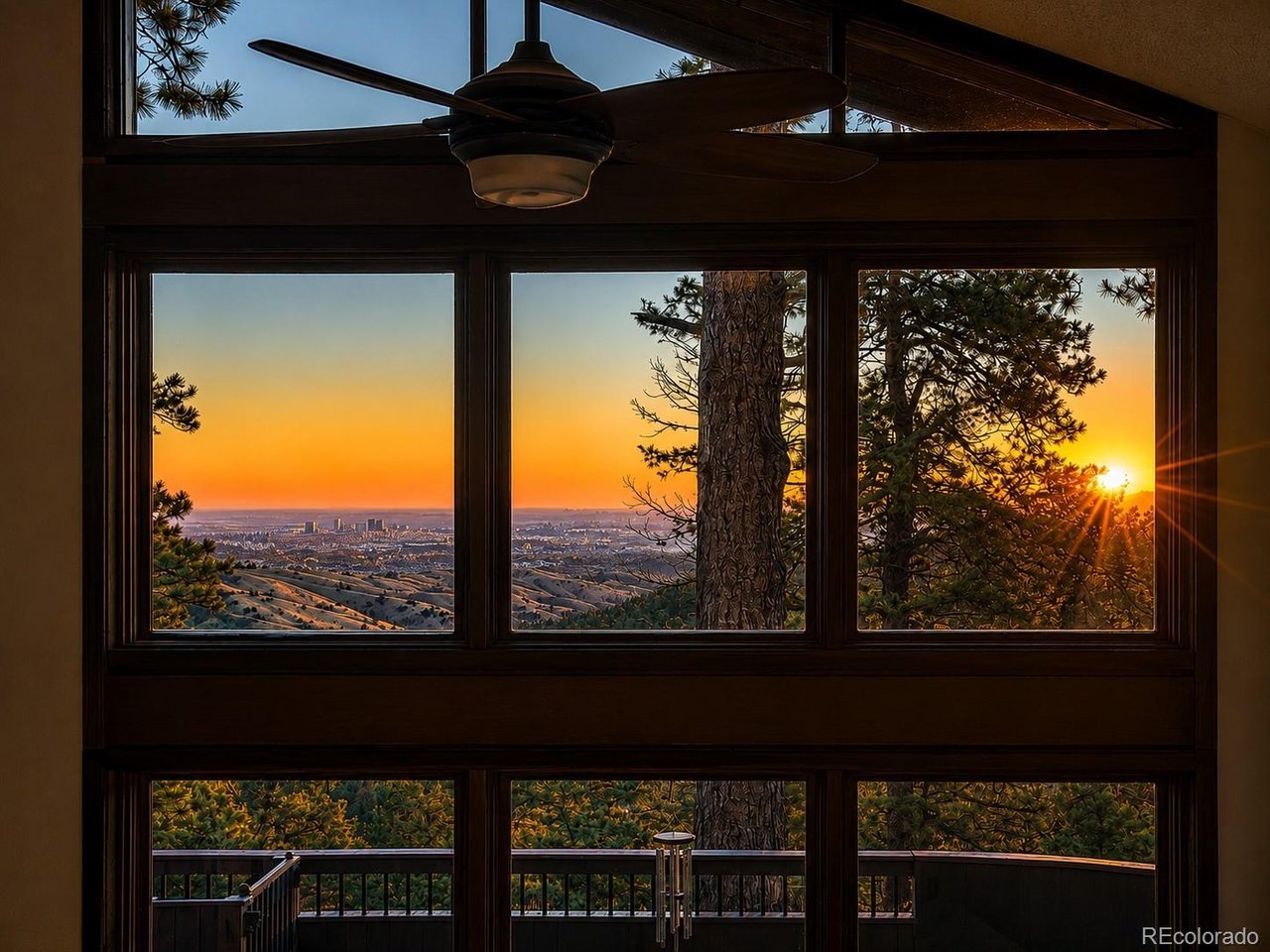 Located in the highly desirable Genesee community, this exceptional 5-bedroom, 5-bath mountain contemporary offers spectacular, unobstructed city views and convenient access to both downtown and the mountains.Walls of windows showcase the views throughout the home, filling the interior with natural light and capturing everything from dramatic sunrises to the sparkling Denver city lights at night. Vaulted ceilings, exposed beams, and distinctive architectural details create a bright, open mountain-contemporary feel.The thoughtfully designed floor plan includes upper-level bedroom suites and a beautifully remodeled main-level primary suite with a spa-inspired bath, including a steam shower, freestanding tub, heated floors, and an expansive walk-in closet. Generous living and entertaining spaces complete this warm and comfortable home.Genesee is one of Colorado's most desirable foothills communities, with miles of private trails, swimming pools, fitness facilities, tennis and pickleball courts, and abundant wildlife. Elk, deer, foxes, and wild turkeys are frequent visitors.A rare combination of city and horizon views, mountain living, and convenient Front Range access-all in the sought-after Genesee community.