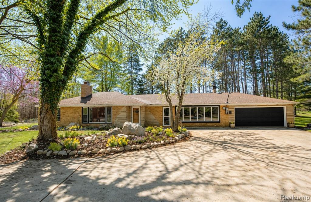 3-bedroom home offering approximately 1,700 sq ft, situated on over 7 acres in Birch Run. This property provides a great combination of open space and functionality, ideal for a variety of uses. The standout feature is the impressive 40x140 barn, equipped with heat and air conditioning, set on a 6-inch concrete slab and complete with a car lift—perfect for hobbyists, storage, or workshop needs. A rare opportunity to own acreage with a versatile outbuilding already in place. Major updates include a new roof in (2017) and new septic system (2025), offering peace of min for years to come!Private Property. Please do not approach the home or drive up the driveway without a confirmed appointment. I would be happy to show you the property if you would like to see it.